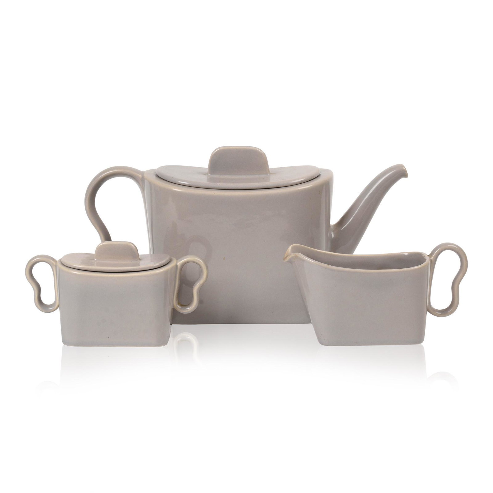 Three Piece Tea Service by Franciscan.: Grey matte glaze, length of teapot 10.5 inches.