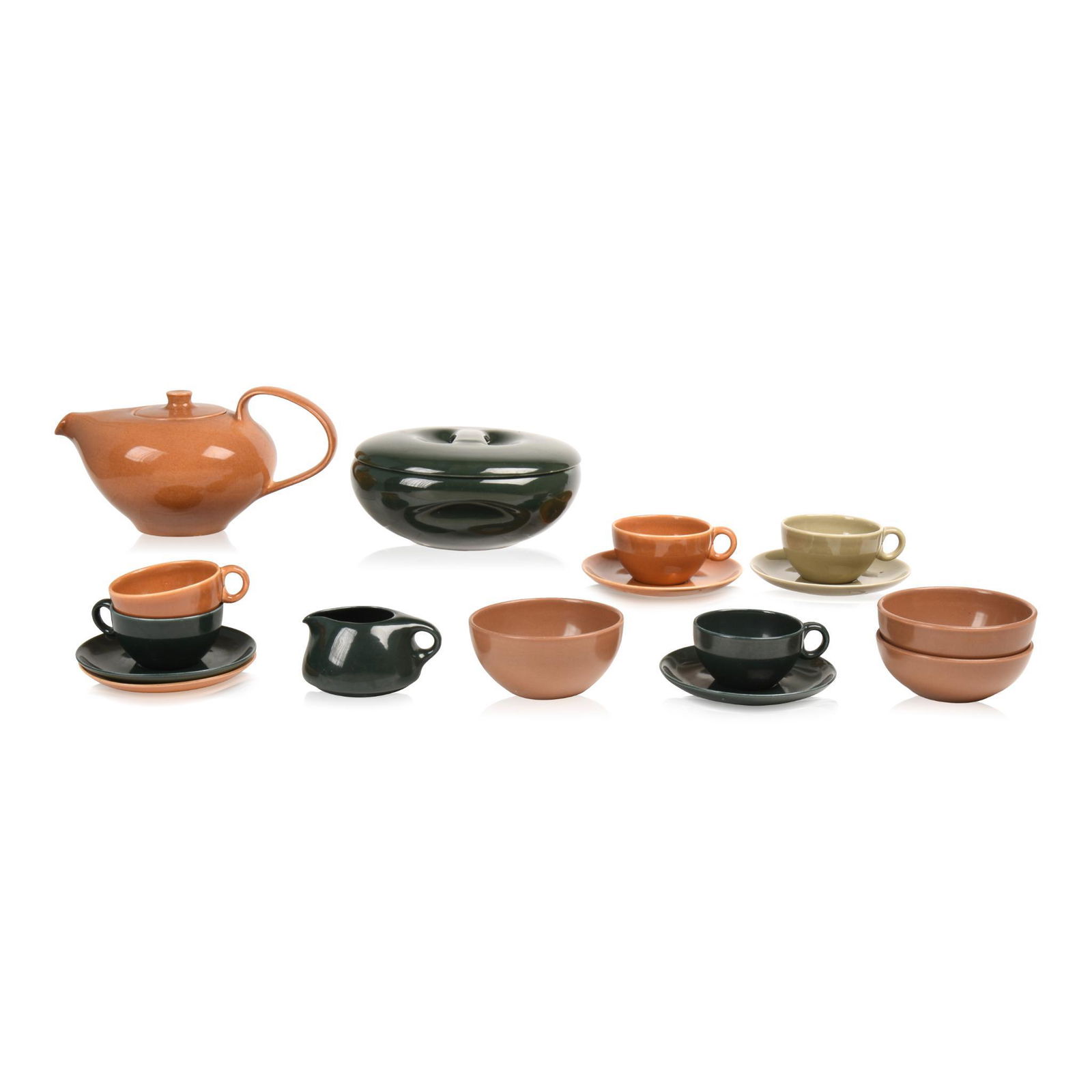 Eleven Pieces of Russel Wright Iroquois Casual China: Teapot, covered casserole, diameter 8.5 inches, two deep soup bowls, cereal bowl, creamer, five cups and saucers.