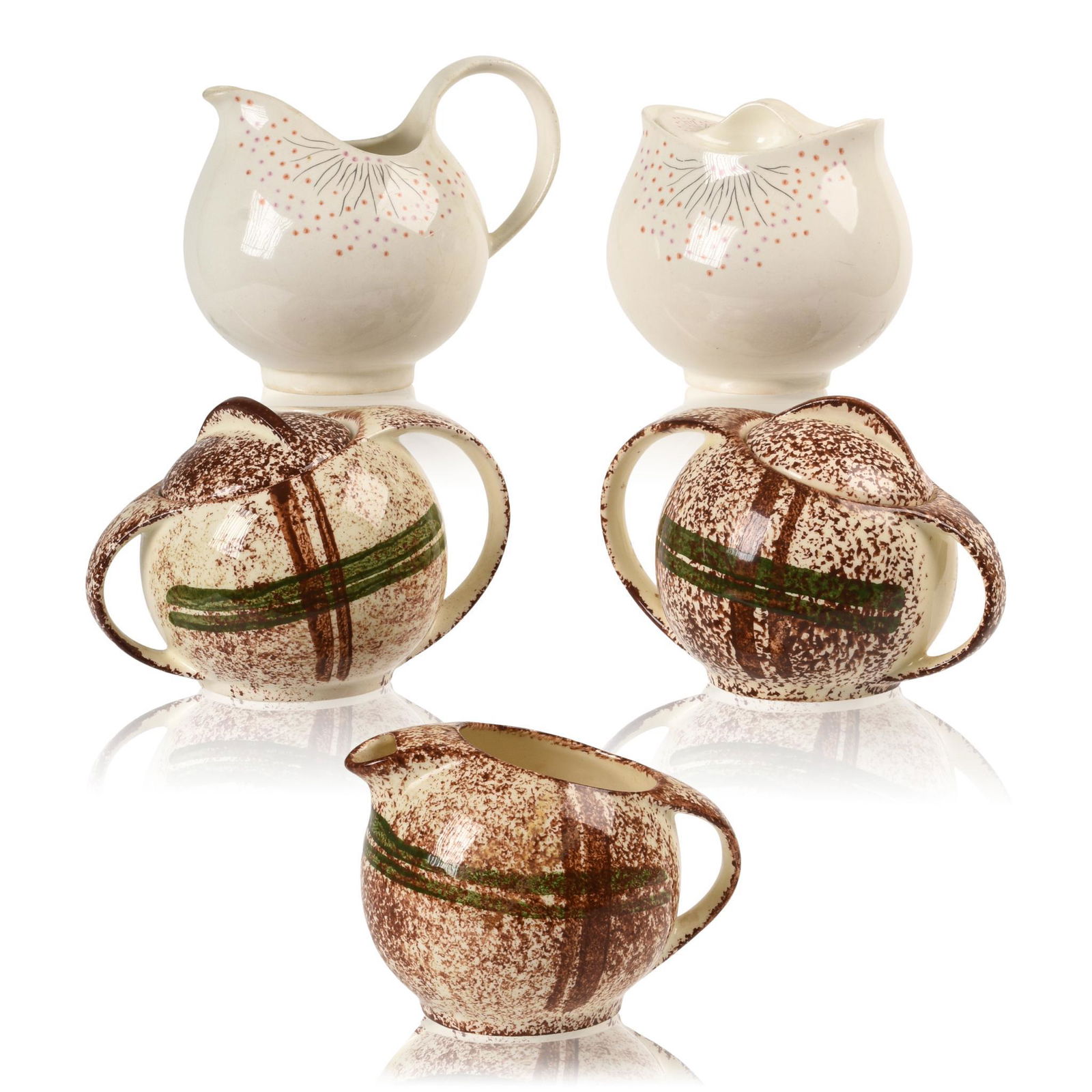 Mid Century Modern Sugar Bowls and Creamers.: Two Hallcraft by Eva Zeisel, three unmarked. Heights 4 to 4.25 inches.