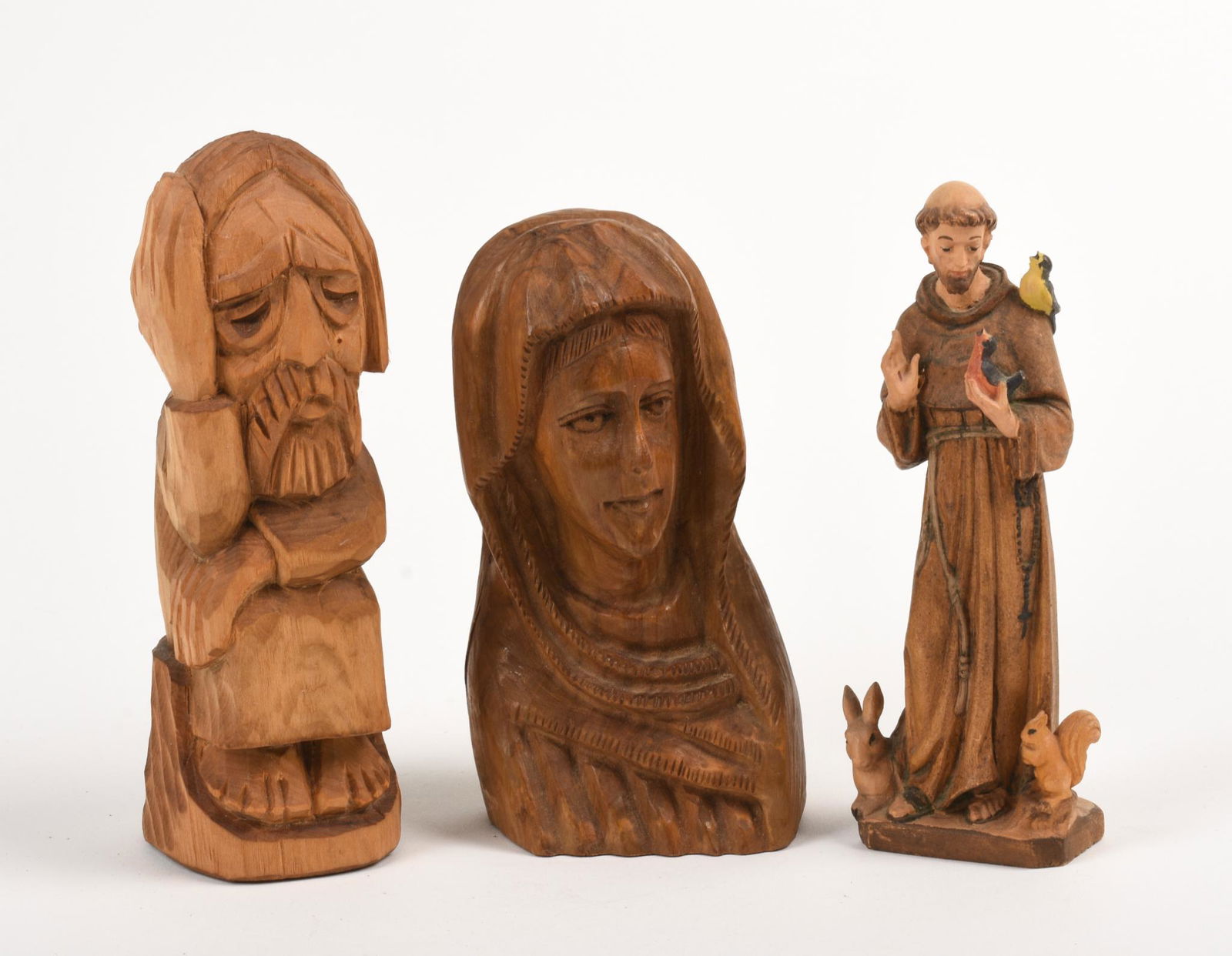 Three Carved Wooden Figures. (1 of 5)