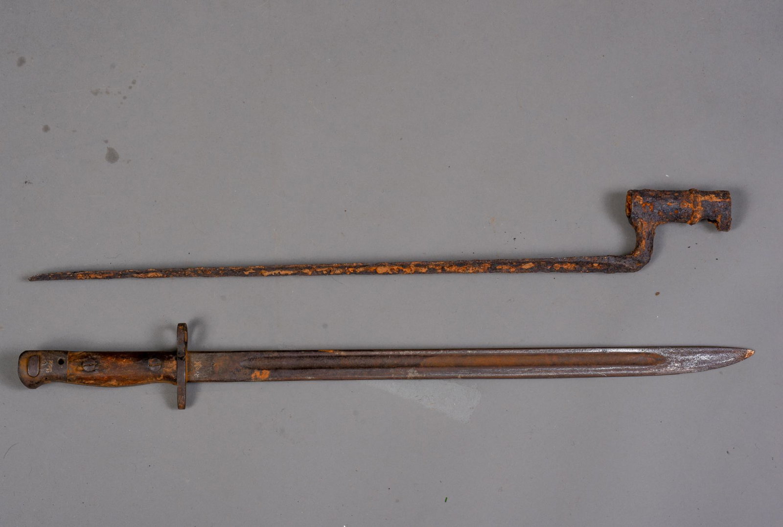 Antique Cutlass and a Bayonet.: Both in relic condition, length of cutlass 21.5 inches.