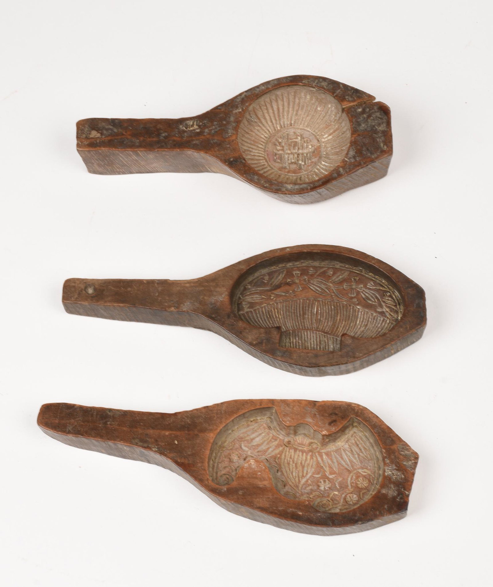 Three Chinese Carved Wooden Butter Molds.: Lengths 7.5 and 8.25 inches.