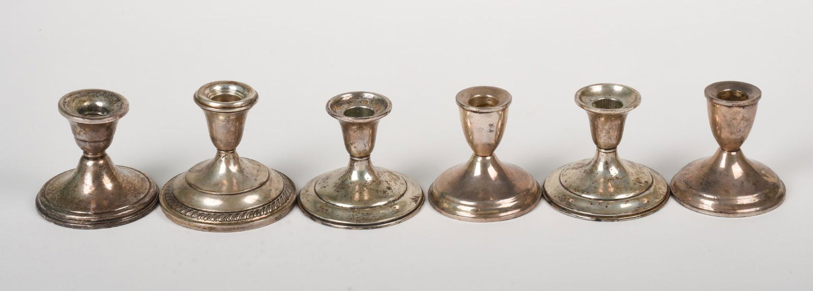 Six Weighted Sterling Candlesticks. (1 of 2)