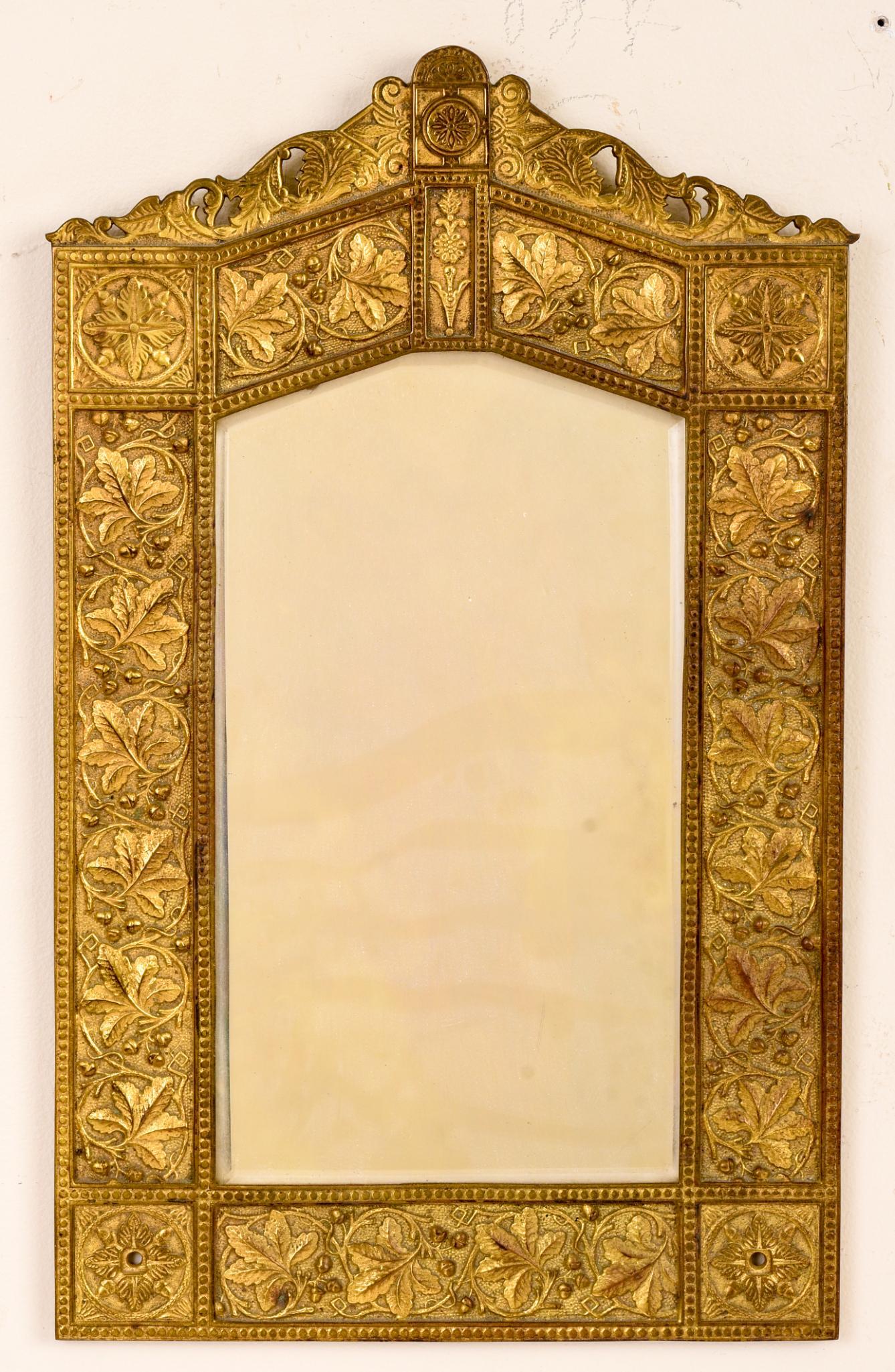Small Continental Brass Mirror: 16.75 x 10.25 inches.