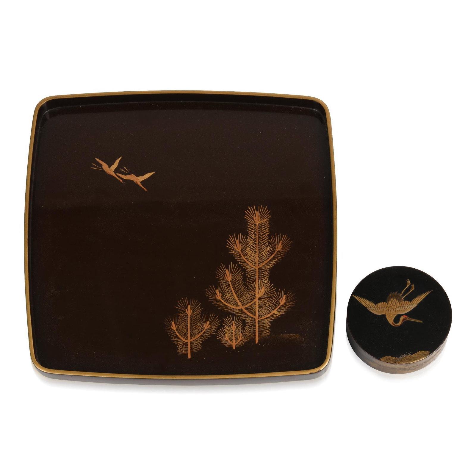 Two Pieces of Japanese Lacquer Signed Heian Zohiko.: Including a footed square tray decorated a pair of cranes and pine trees and a round kogo box decorated with a single crane flying above waves, both pieces signed with Heian Zohikoâ€™s elephant m
