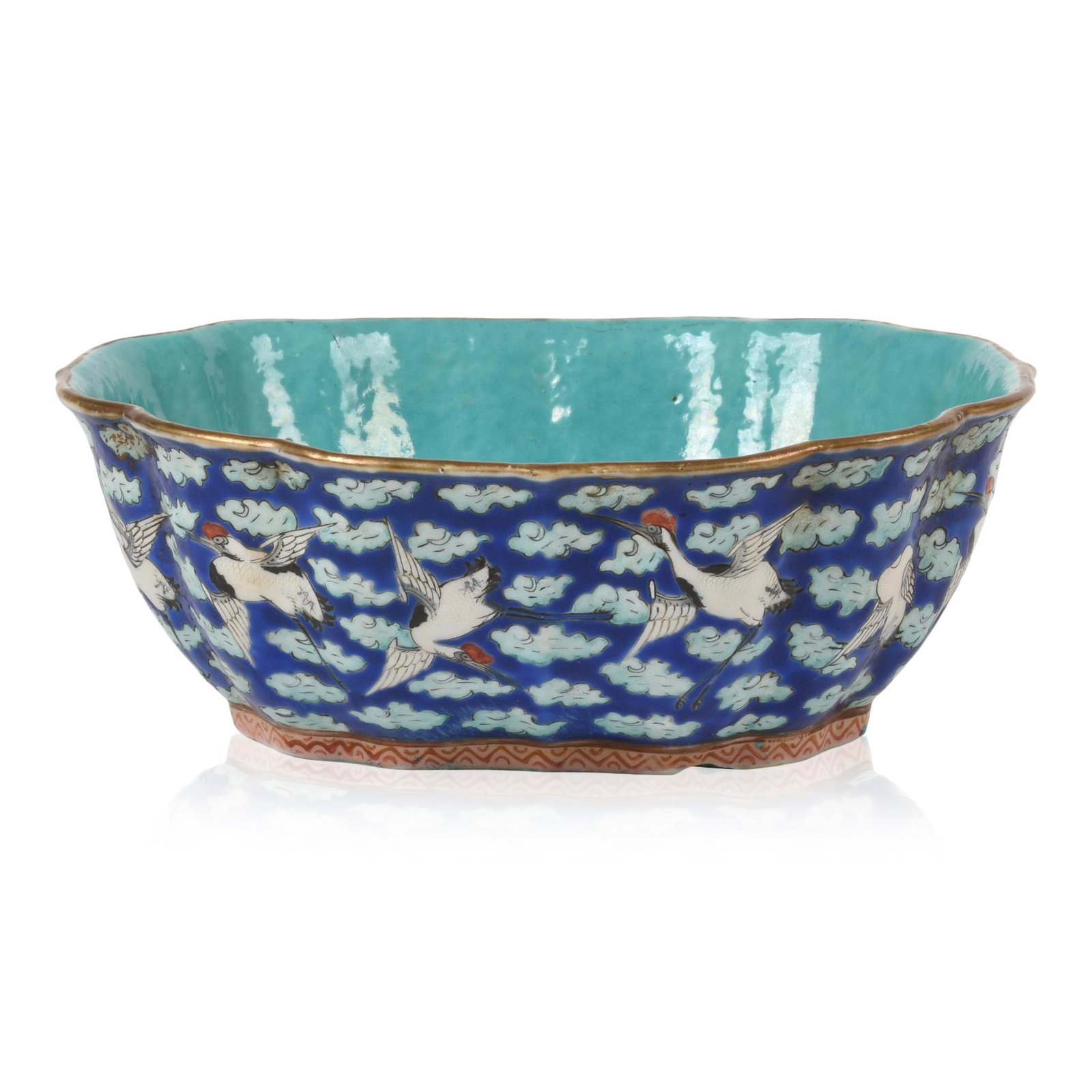 Chinese Famille Rose Bowl: Cranes and clouds on a blue ground, worn Tongzhi mark on bottom, 19th c., width 7.75 inches, depth 6.75 inches, height 2.625 inches.