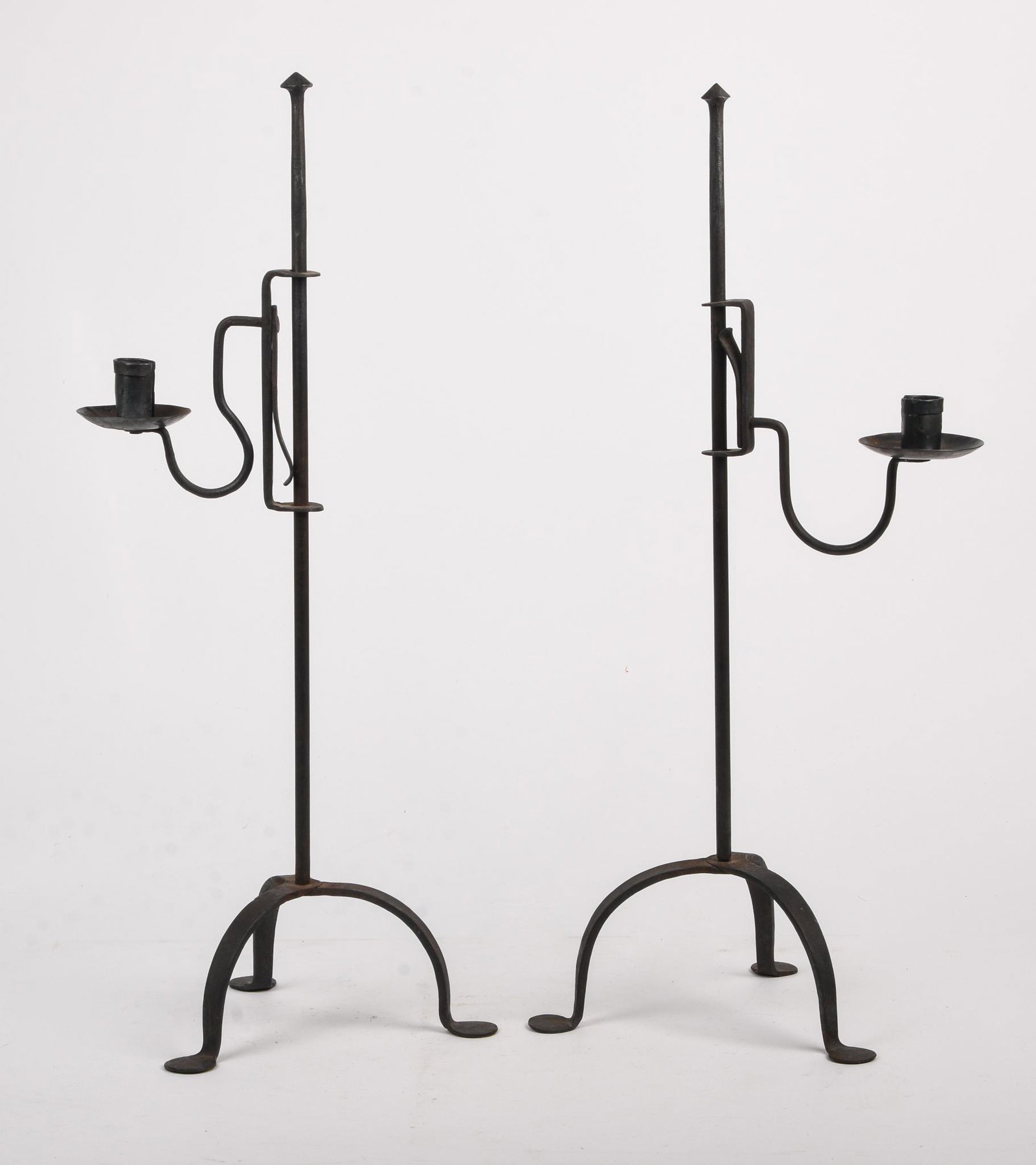 Pair of Colonial Style Penny Foot Adjustable Candleholders.: Height 23 inches, 20th century.