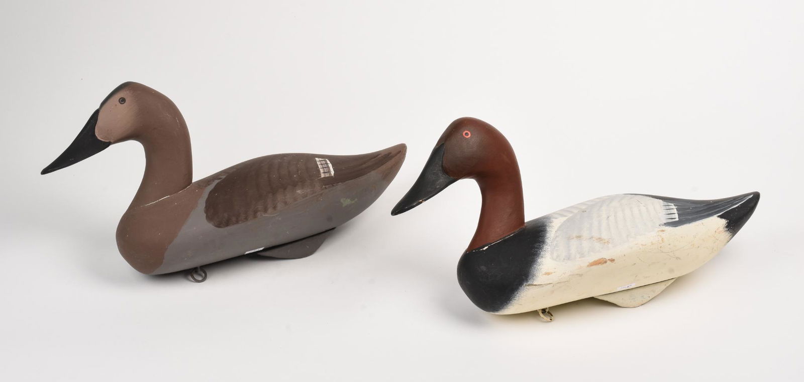 Pair of Capt. Harry Jobes Carved and Painted Duck Decoys: Length 16 inches.