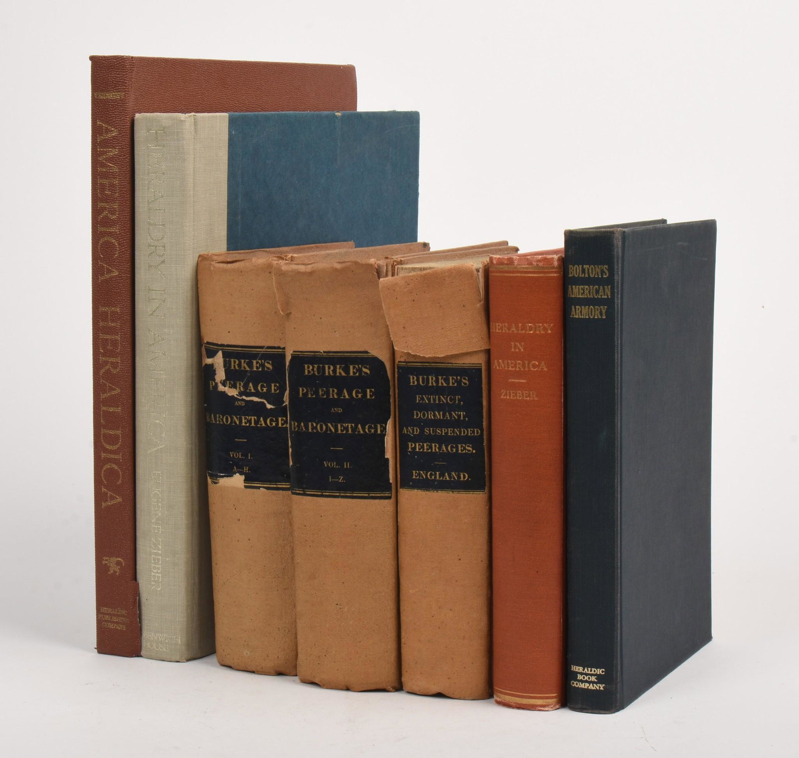 A Collection of Books on Heraldry.: Burke's Peerage and Baronetage, Volumes I and II, London, 1834. Burke's Extinct, Dormand and Suspended Peerages. Bolton's American Armory, Baltimore, 1964. America Heraldica, Heraldic Publ