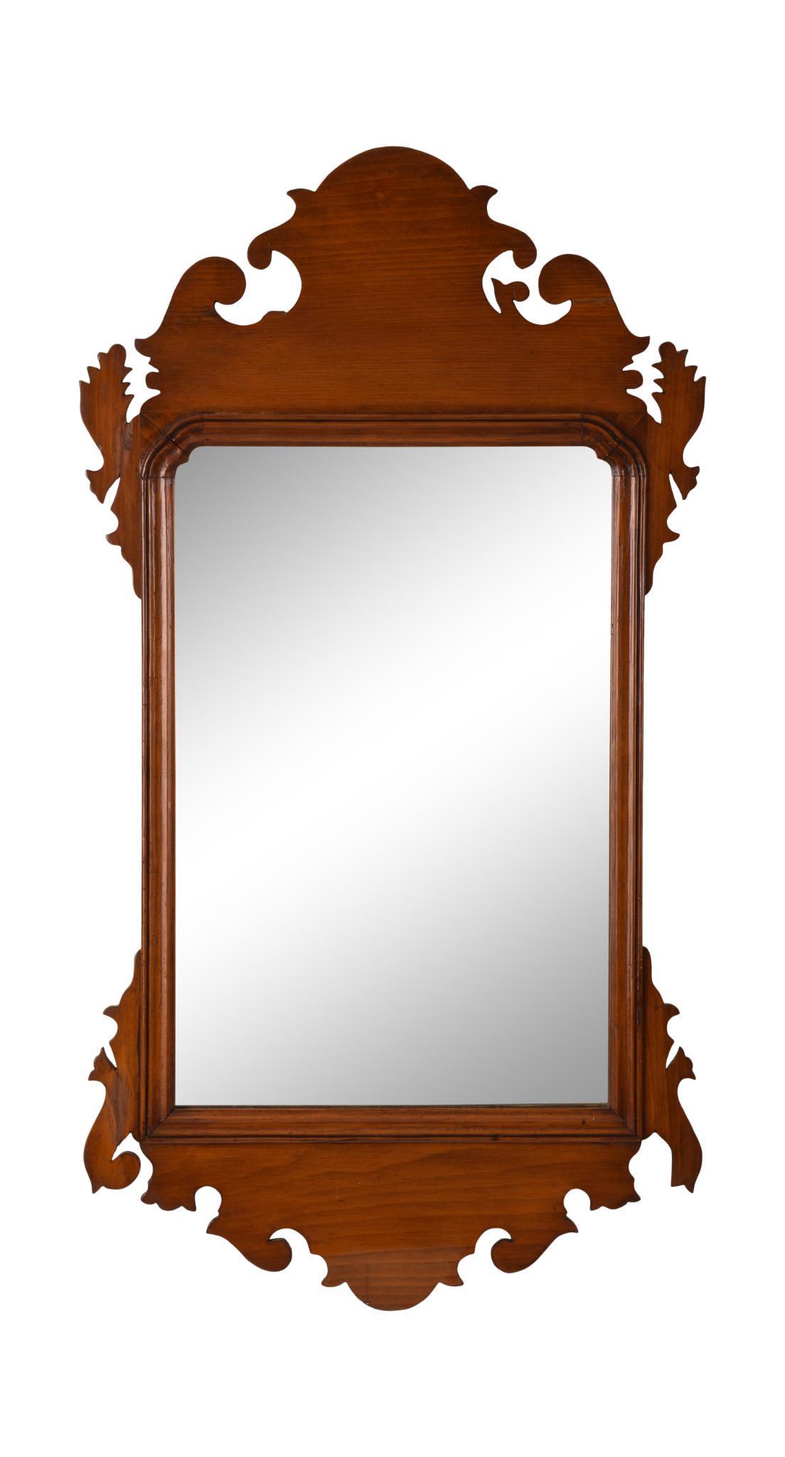 New England Cherry Chippendale Mirror.: 31 x 17 inches, mirror plate 17.5 x 11.5 inches. This item is not eligible for in-house shipping. If shipping is requested, it will be transferred to our third party shipping partner Parcel Room, in P