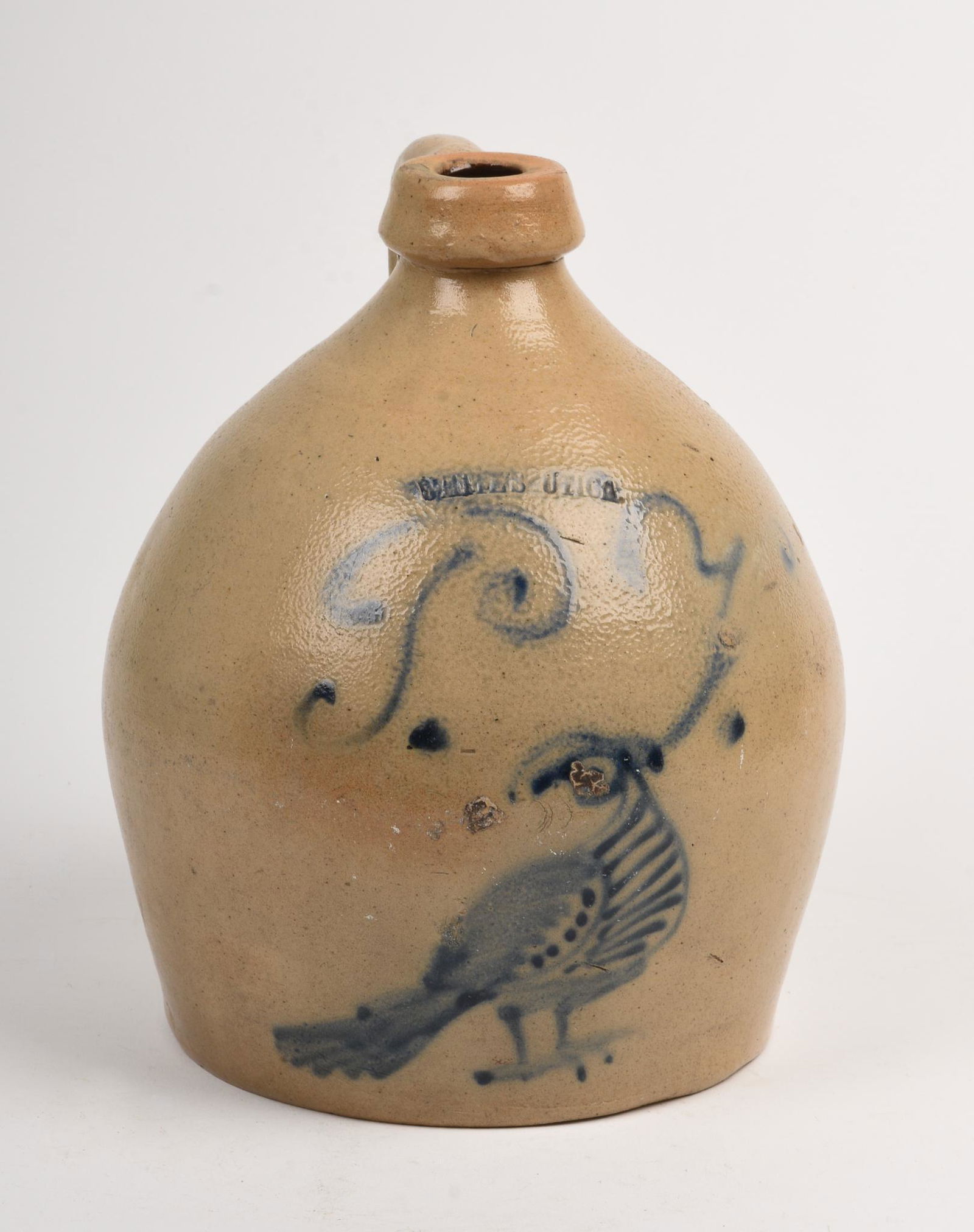 White's Utica Jug With Cobalt Blue Peacock Decoration. (1 of 2)