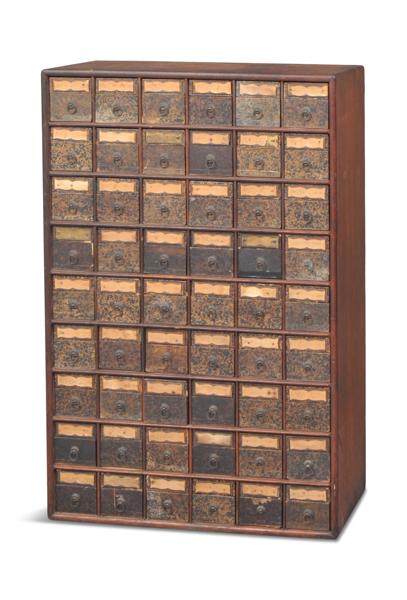Oak Cubby Hole Cabinet with Storage Boxes.: Late 19th c., fitted with 54 marbled cardboard boxes with hinged lids, brass ring pulls and label holders, box fronts are square so the cabinet can be used vertically or horizontally. Height 46.5 inch
