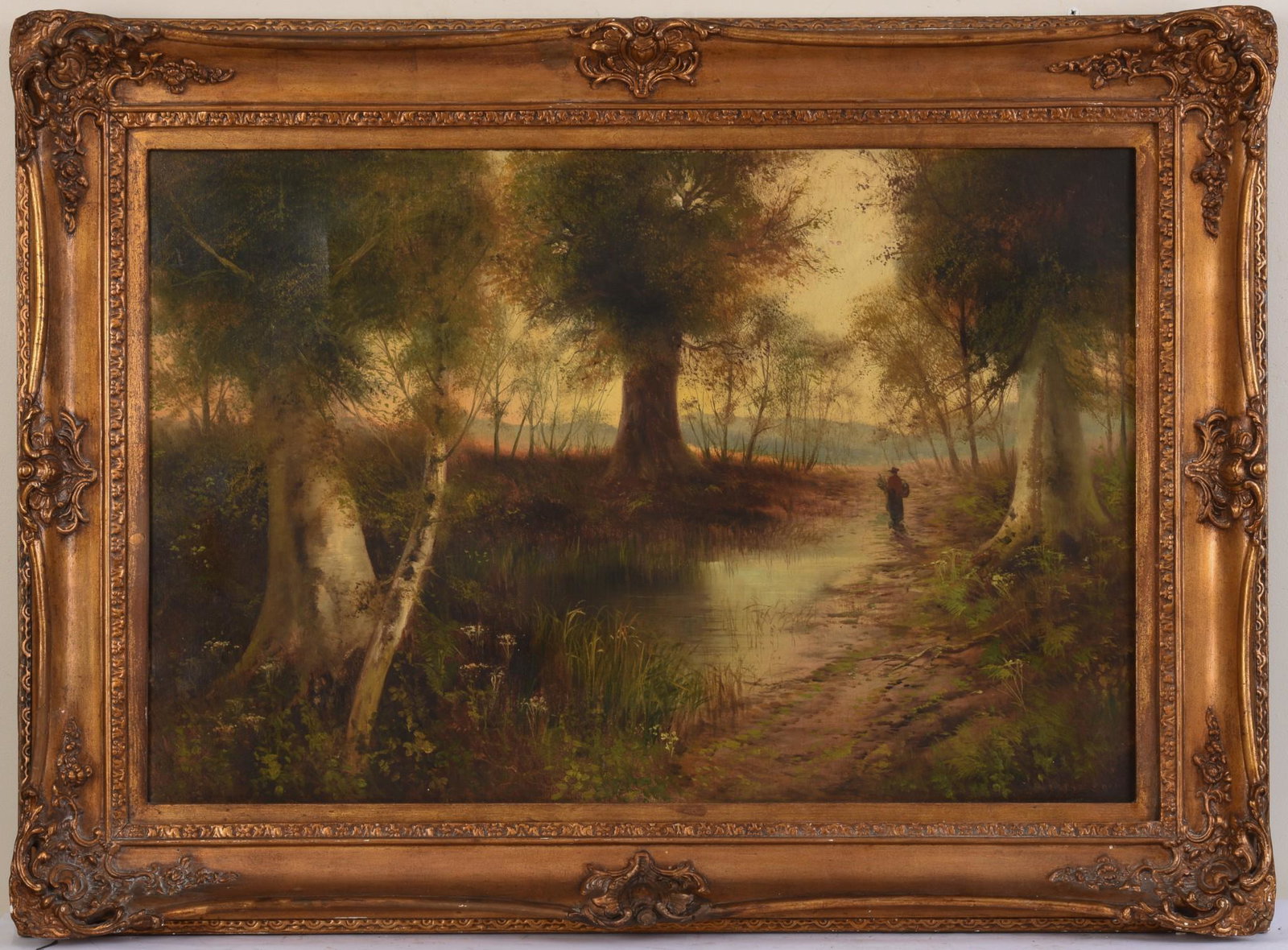 Landscape With Figure on a Path.: American school, 19th century. Oil on canvas, 24 x 36 inches, signed J. Williamson lower right. In a period gilt frame, 34 x 45 inches.