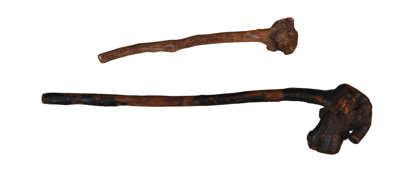 Two Native American Clubs. (1 of 2)