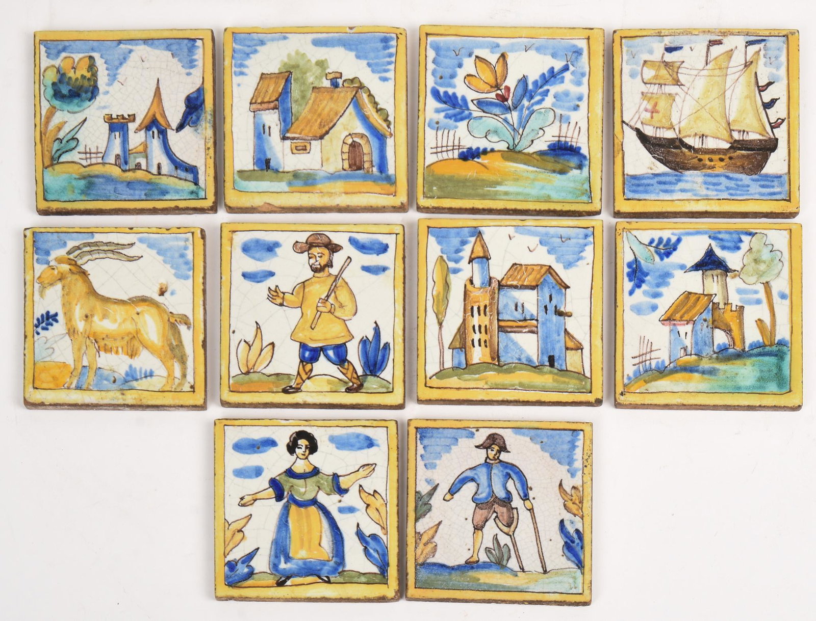Ten Antique Delft Style Tiles.: Three with figures, one with a goat, six with castles and buildings. Each 5.25 x 5.25 inches.