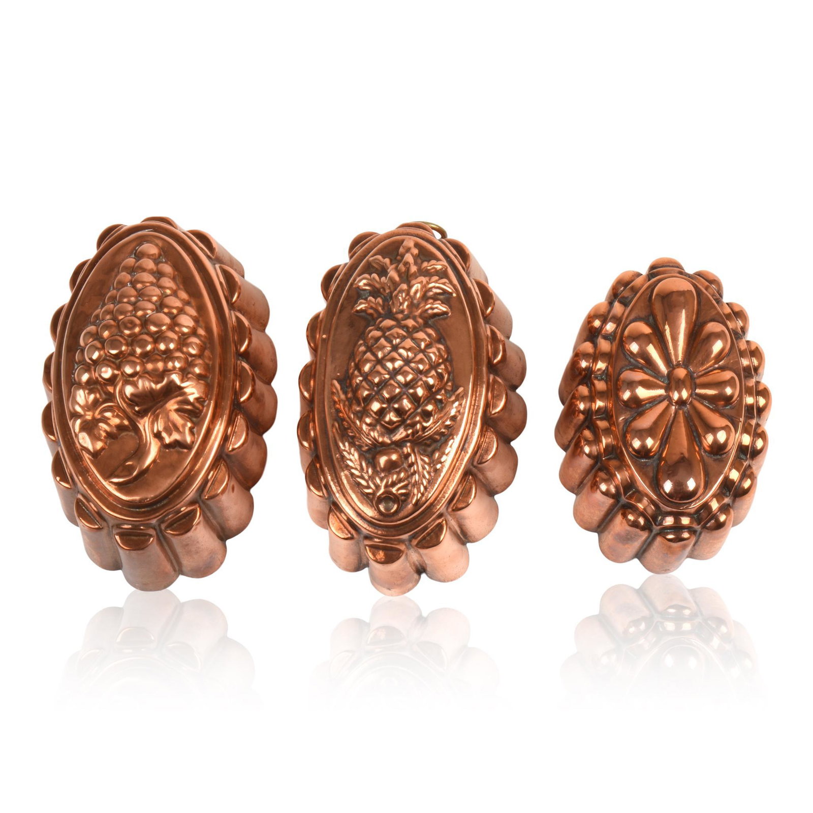Three 19th Century Copper Food Molds.: One with cluster of grapes, length 7 inches. One with pineapple, length 6.75 inches. One with flower, length 5.5 inches.