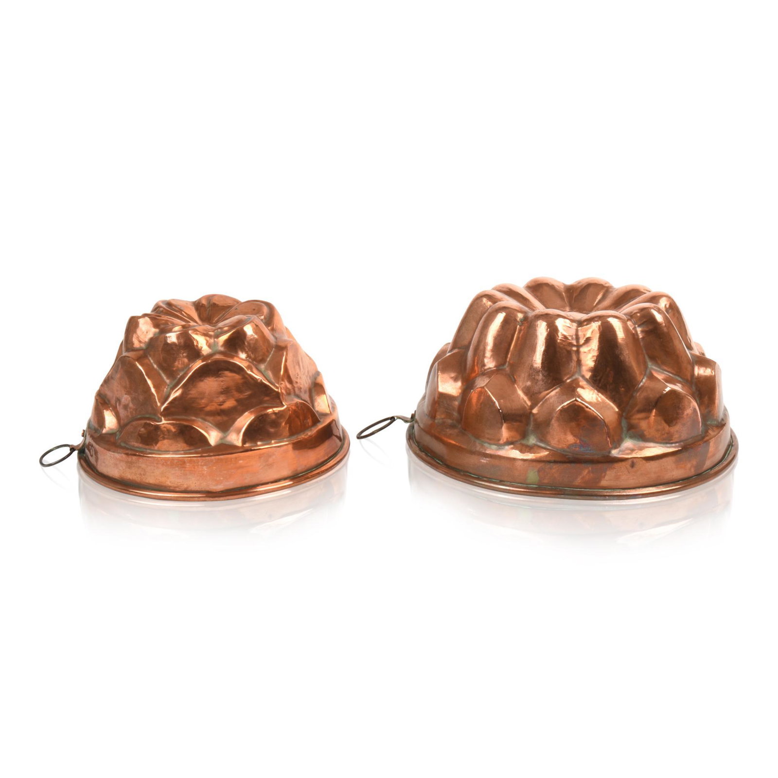 Two 19th Century Copper Food Molds.: Diameters 7.5 and 9 inches.