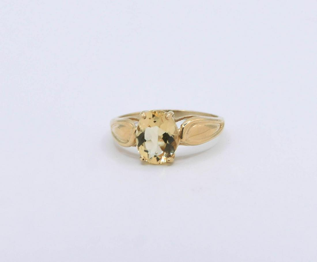 14K Yellow Gold Gold Beryl Ring: 9mm X 7mm Oval Gold Beryl Ring 2.1 grams. Size 6