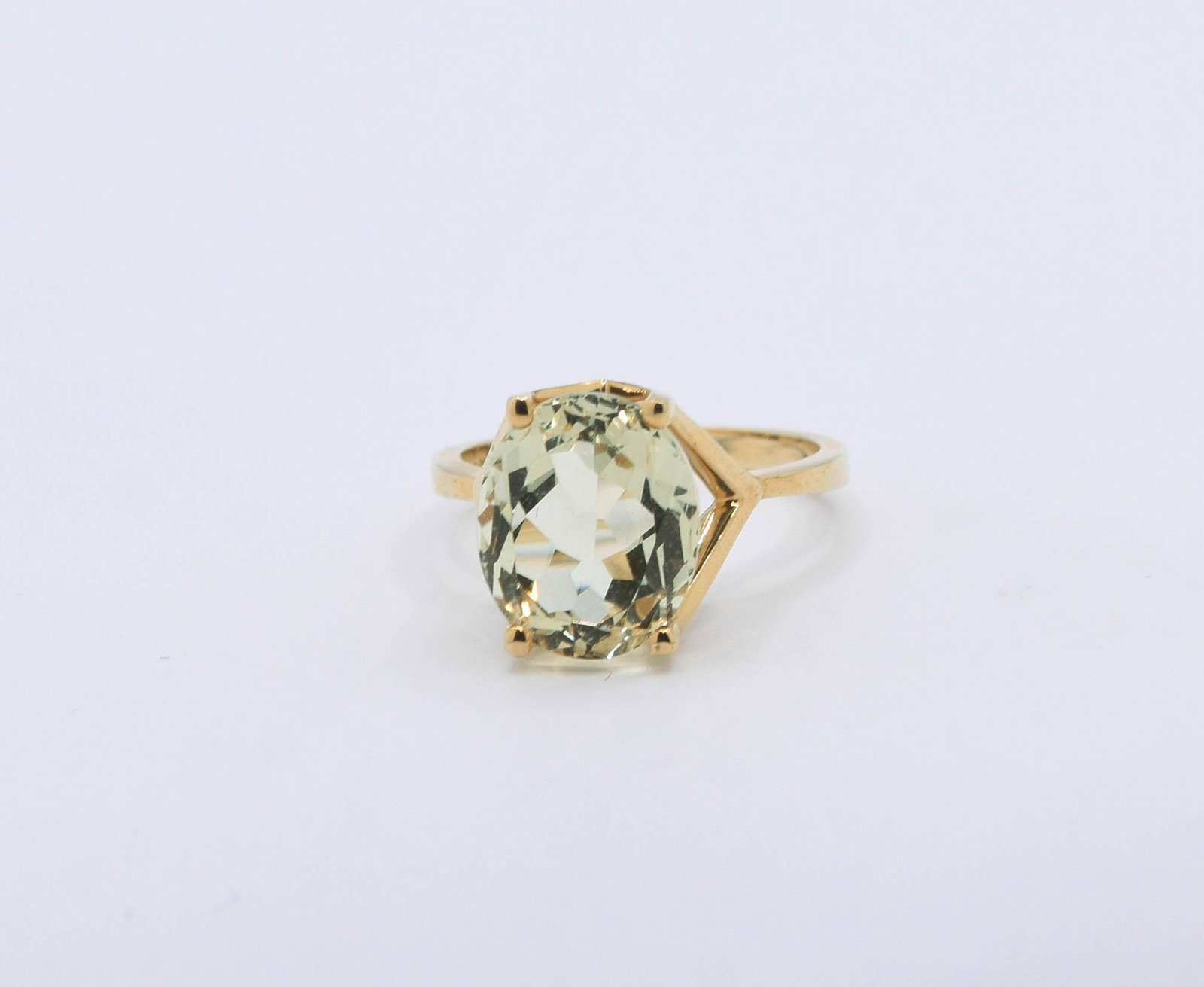 14K Yellow Gold Titanite Ring: 12mm X 10mm Oval Titanite Ring 3.9 grams. Size 6