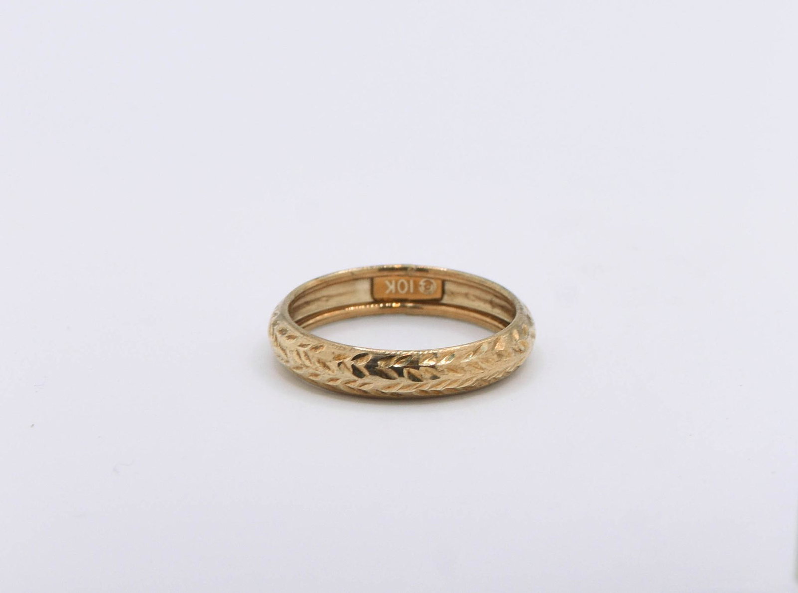 10K Yellow Gold Band: Diamond Cut Gold Band 0.7 grams. Size 6