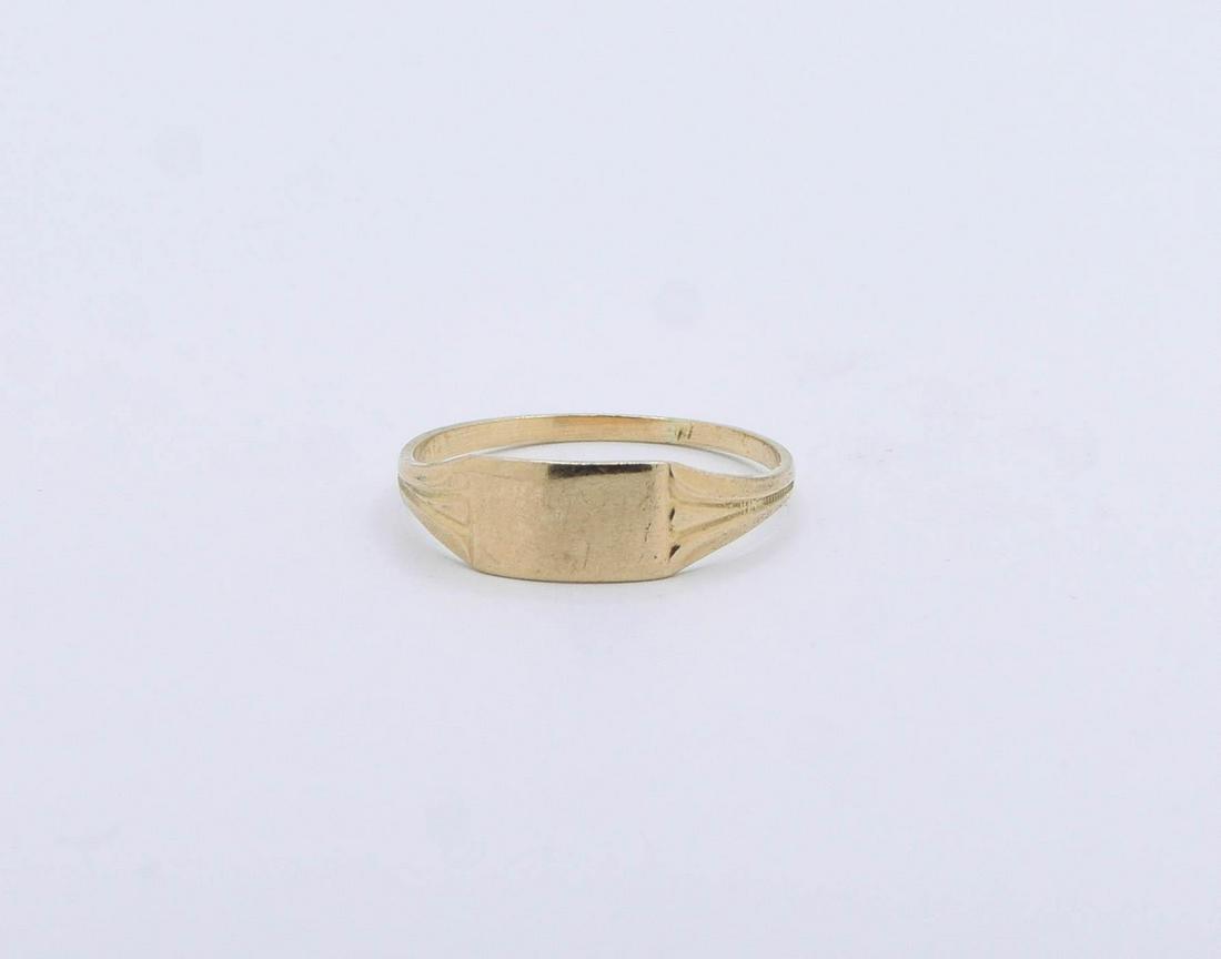 10K Yellow Gold Ring: Baby Signet Ring 0.7 grams. Size 3.75