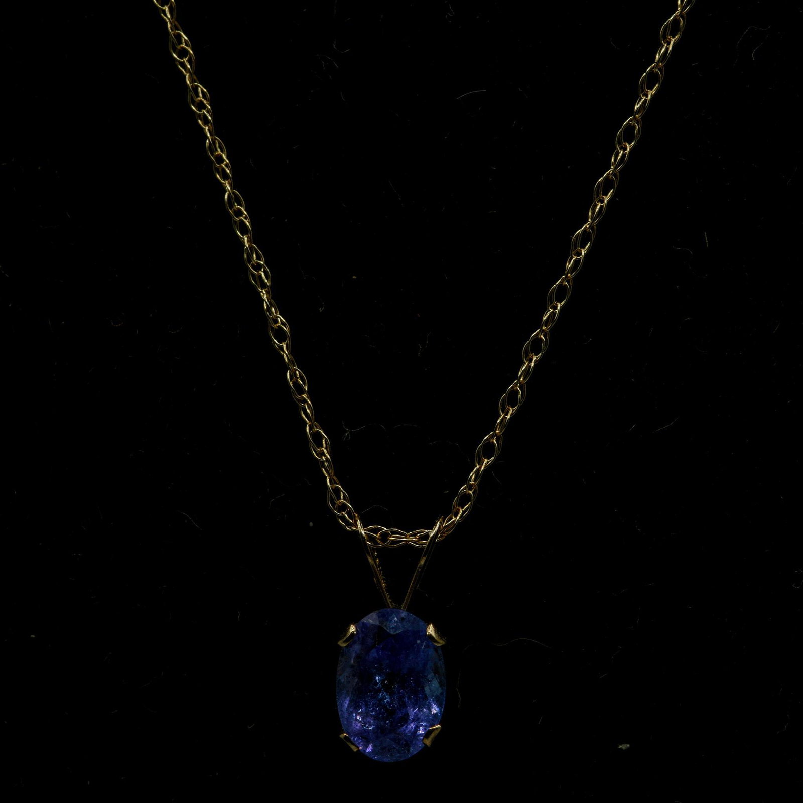 14K Tanzanite Necklace: 7mm X 5mm Oval Tanzanite Pendant Necklace 18", 0.9 grams
