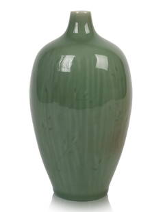 Gerd Bogelund Celadon Vase for Royal Copenhagen.: Carved floral decoration on a background of incised vertical lines, artists monogram and Royal Copenhagen three wave mark, also inscribed 15 and W. Height 8.5 inches.