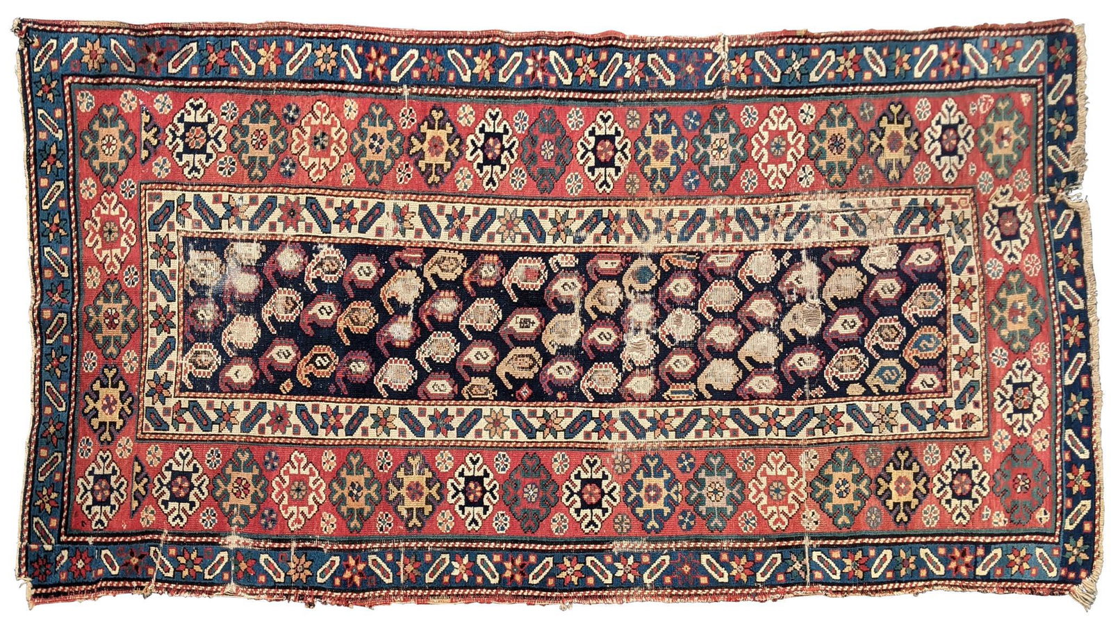 Caucasian Rug.: 8 feet by 46 inches. Tear to one end, wear spots.