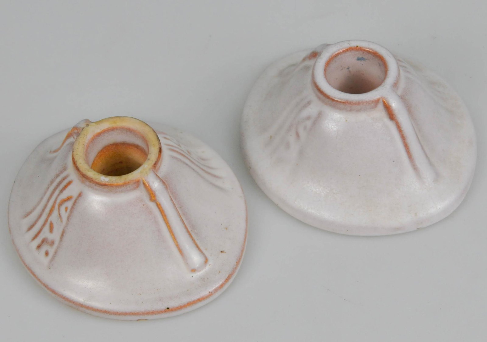 MID CENTURY MODERN ROSEVILLE CANDLE HOLDER PAIR 1110: 4 3/8" across. no chips or cracks. need cleaning. cream to orange color