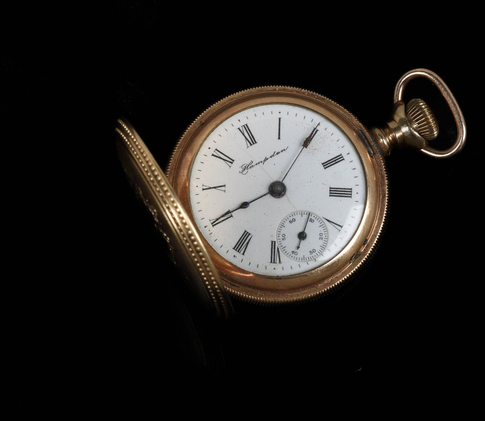 Hampden Molly Stark Pocketwatch.: Serial 1349833, 7 jewels, circa 1899. Diameter 1.25 inches. Lid does not close, does not appear operational.