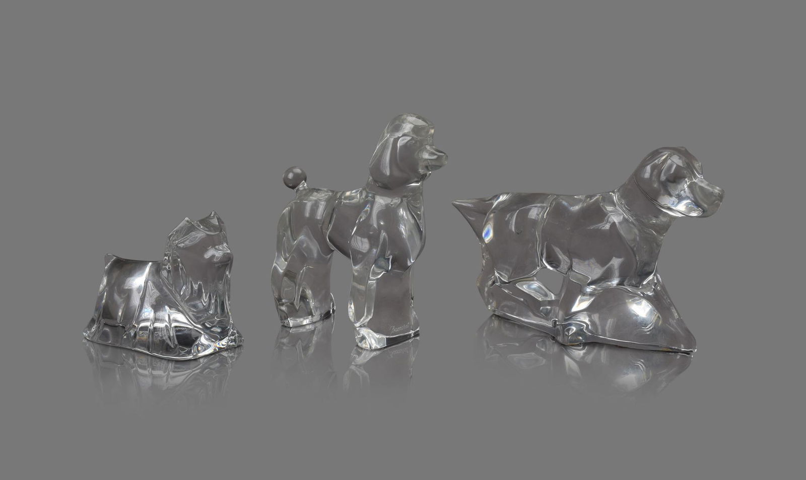Three Baccarat Crystal Dog Figures. (1 of 4)
