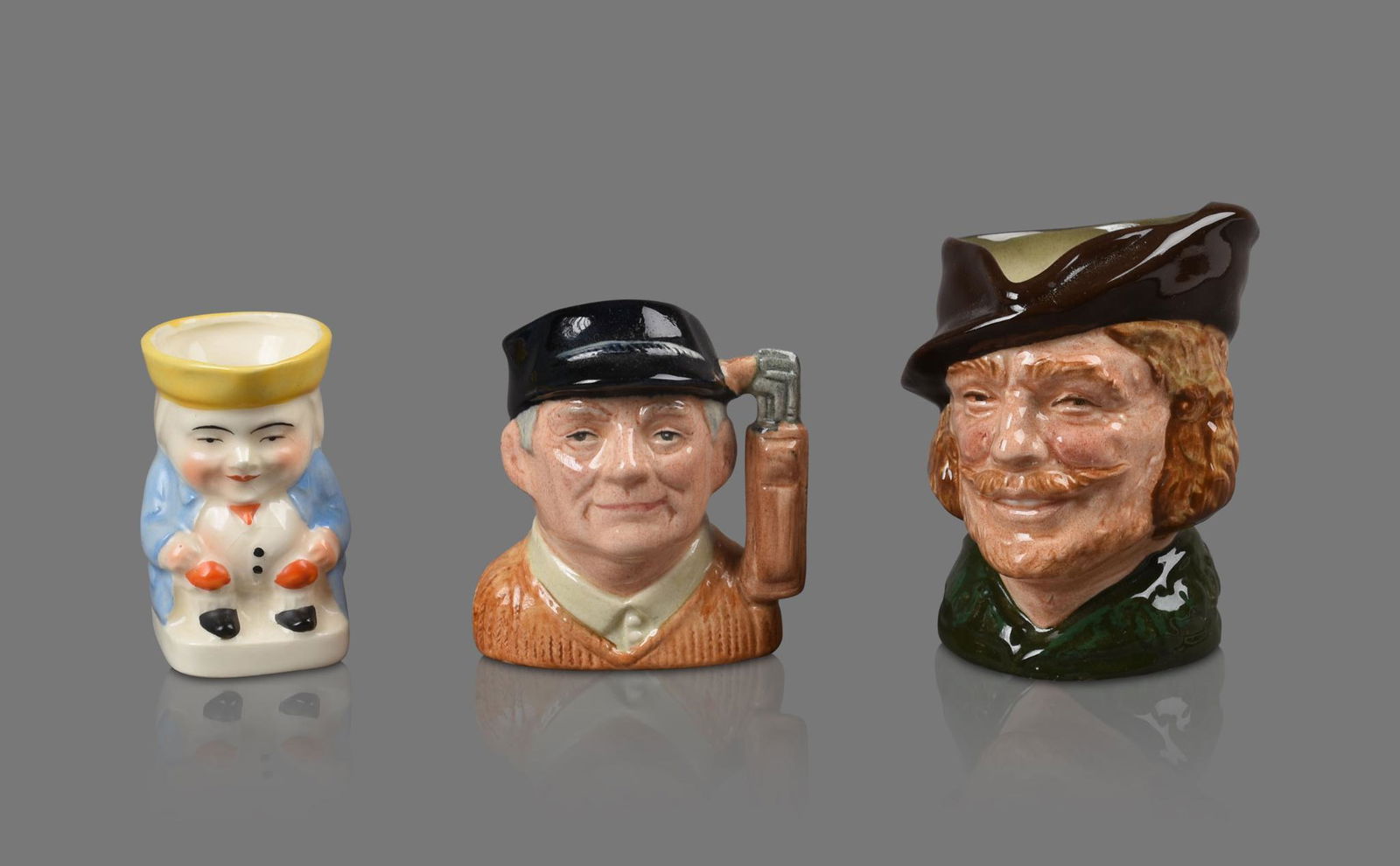 Two Royal Doulton Toby Pitchers. (1 of 5)