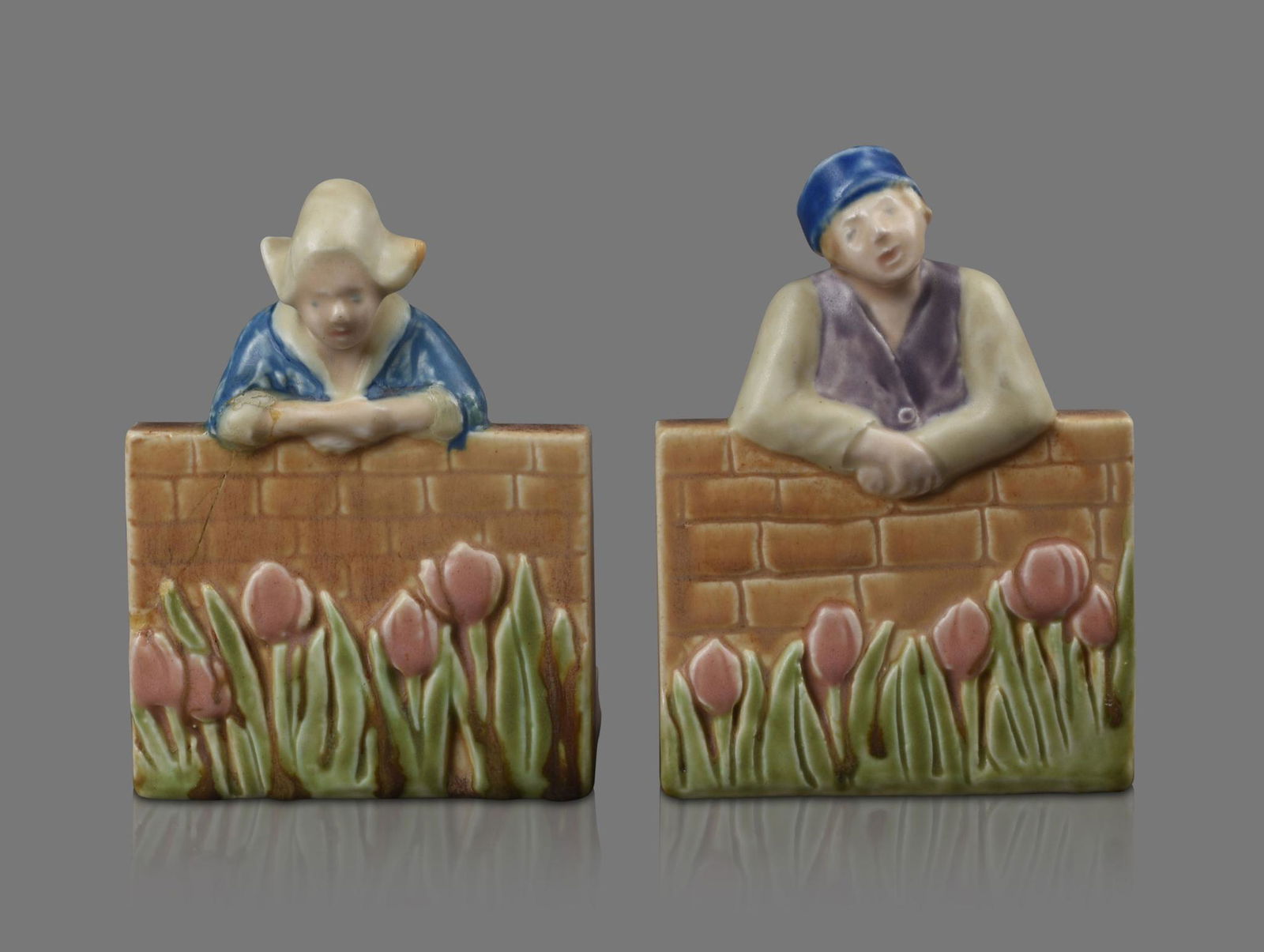 Rookwood Pottery Dutch Boy and Girl Bookends.: Height 6.25 inches, impressed mark.