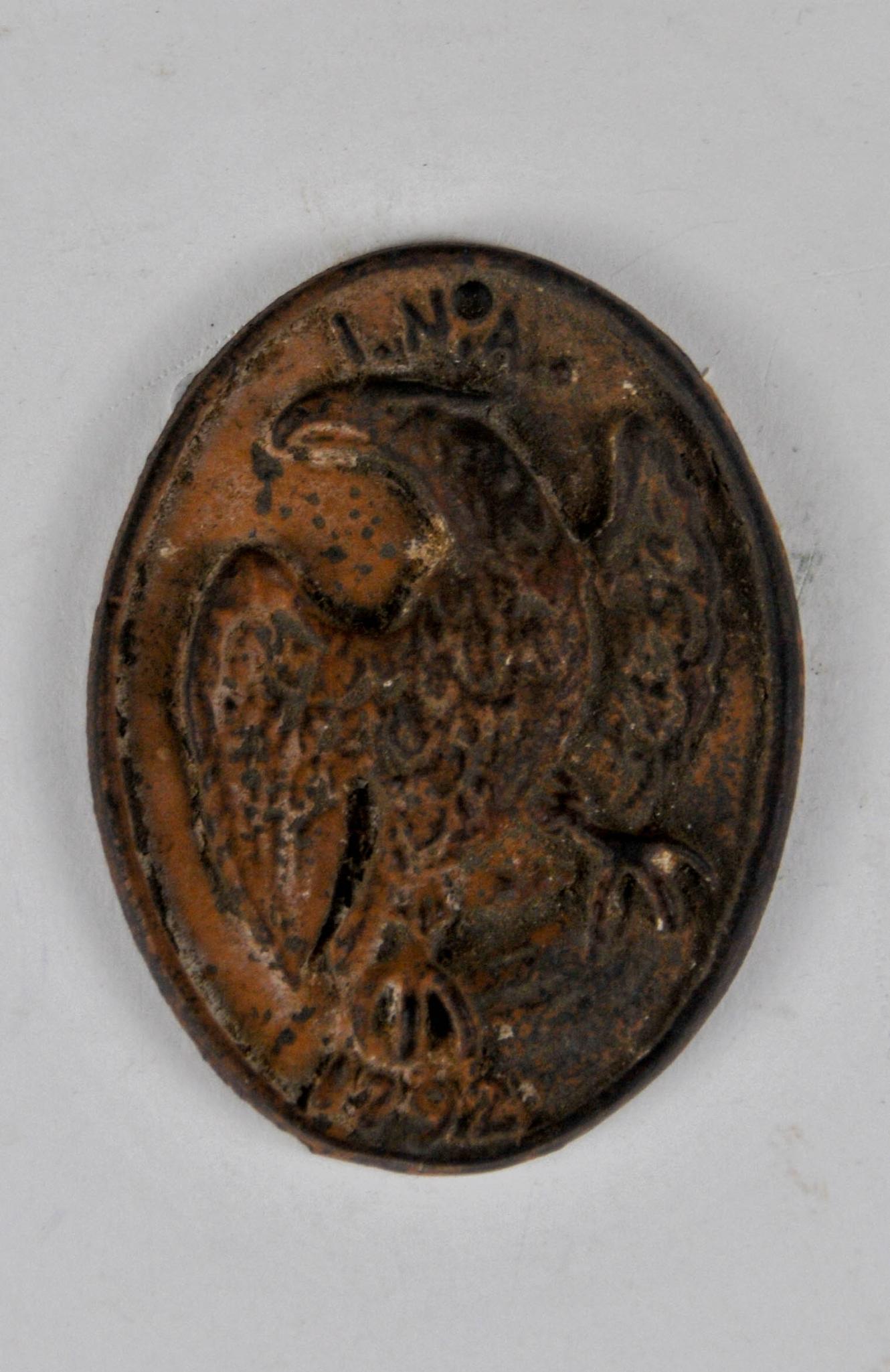 Vintage Wilton Cast Iron Fire Mark. (1 of 2)