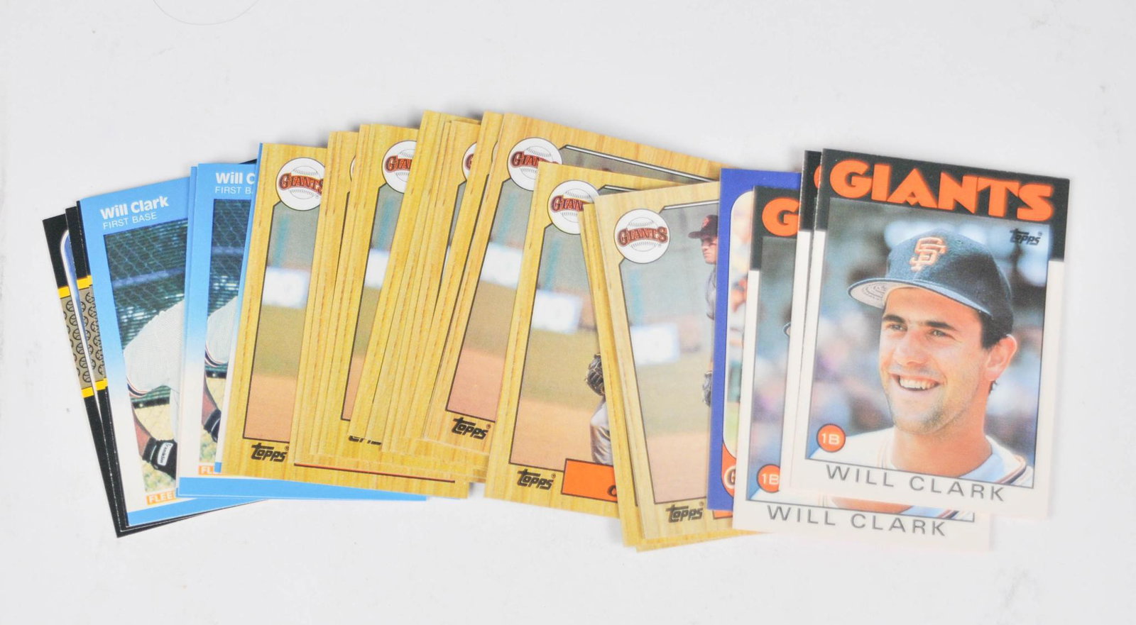 31 Will Clark Rookie Cards.: Ungraded, very nice condition.