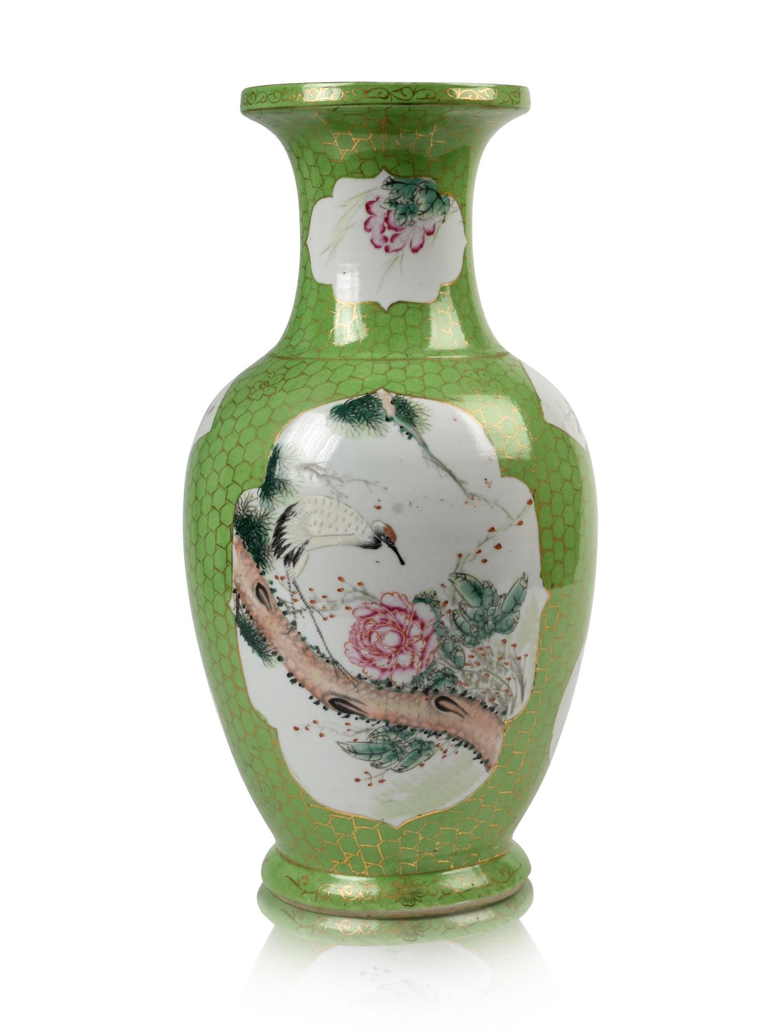Large Chinese Famille Rose Vase.: Bird and flower panels on a lime green ground, the green ground decorated in a basketry pattern in gilt, Chinese mark and Made in China on bottom, Republic Period. Height 17.25 inches.