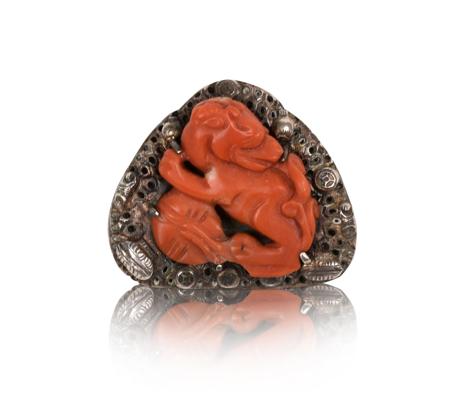 Chinese Carved Coral Foo Dog and Silver Pin.: Stamped Silver and Made in China, early 20th c.. The well-carved coral possibly earlier. Width 1.25 inches.
