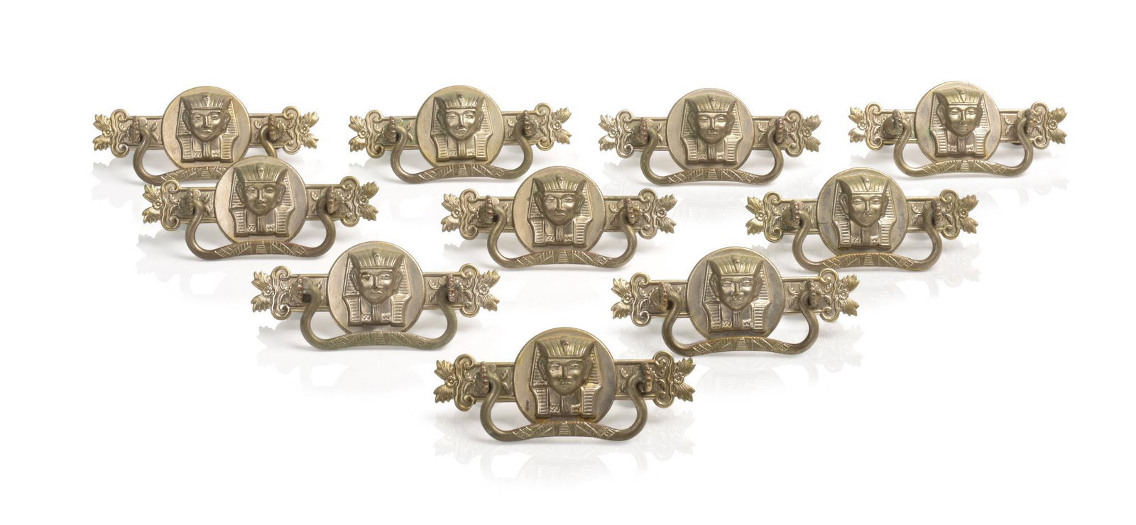 Set of Ten Antique Egyptian Revival Metal Drawer Pulls.: Width 4.25 inches.