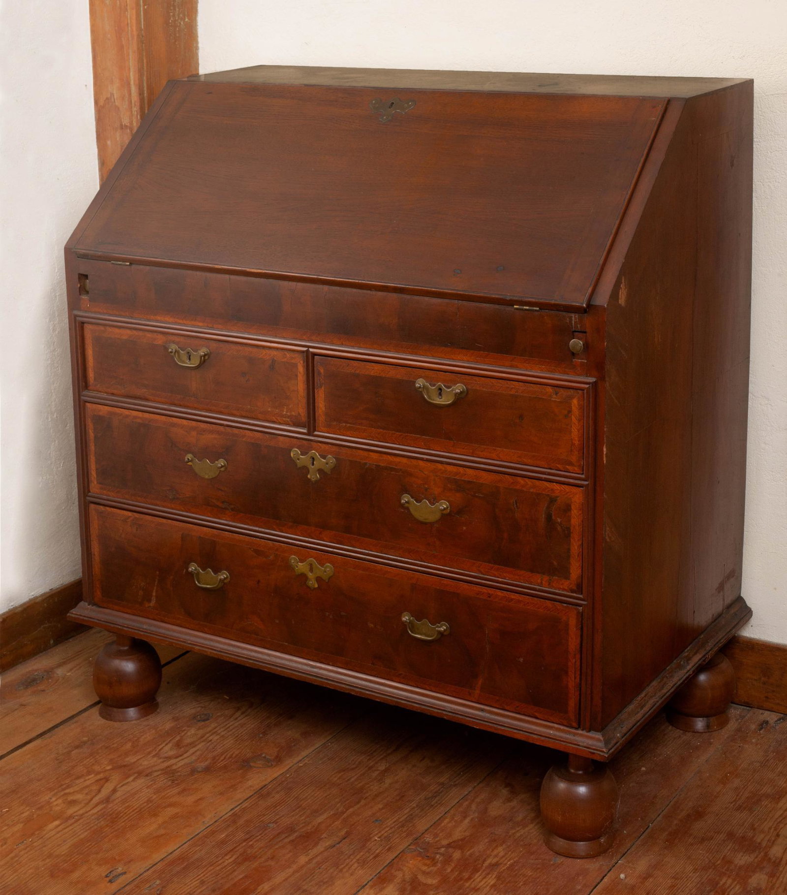 MASSACHUSETTS WILLIAM AND MARY SLANT LID DESK.: Circa 1720. With fitted interior and well, height 40 inches, width 35.24 inches, depth 18.5 inches. Provenance: Robert & Frannie Lord Collection, East Boothbay, Maine. CONDITION: Professional turn