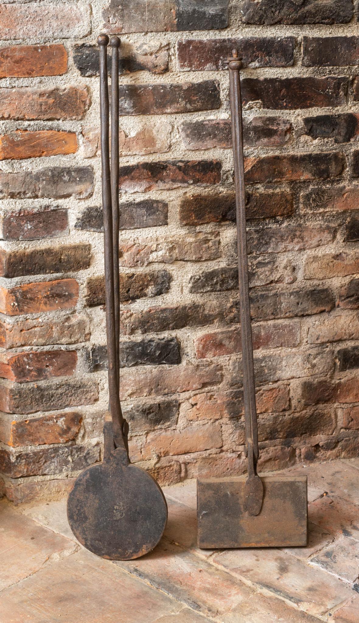 TWO 18TH CENTURY IRON FIREPLACE IRONS. (1 of 2)