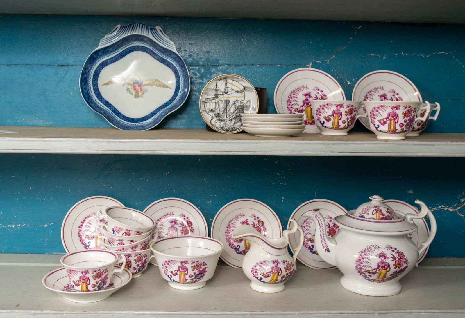 CERAMIC TEA SET.: with transfer decoration of a maiden with a basket of flowers together with Mottahedah Bowl and coasters. 19th century, 8 1/2" long, 6 1/2" high, 5 3/4" wide, teapot CONDITION: Good antiq