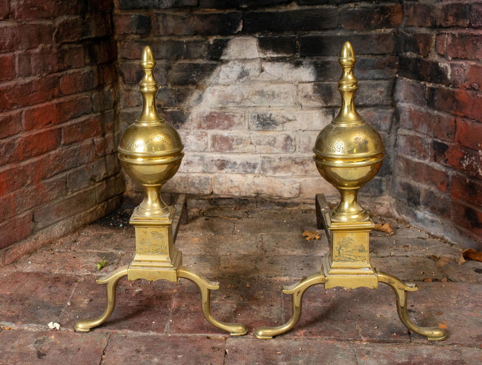 PAIR OF BELTED BALL BRASS ANDIRONS WITH ENGRAVED PLINTHS. (1 of 2)
