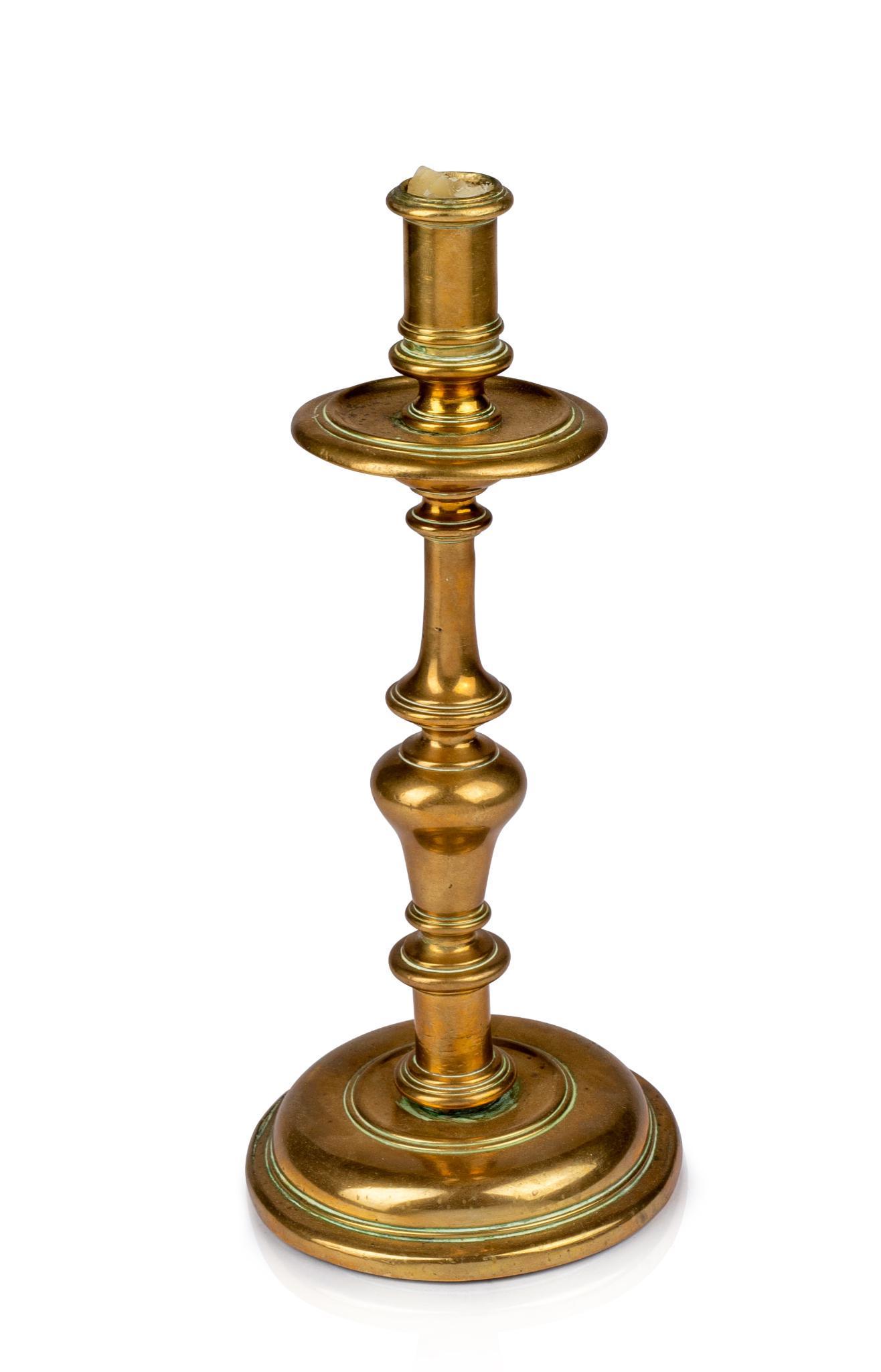 17TH CENTURY SPANISH BRASS CANDLESTICK. (1 of 3)