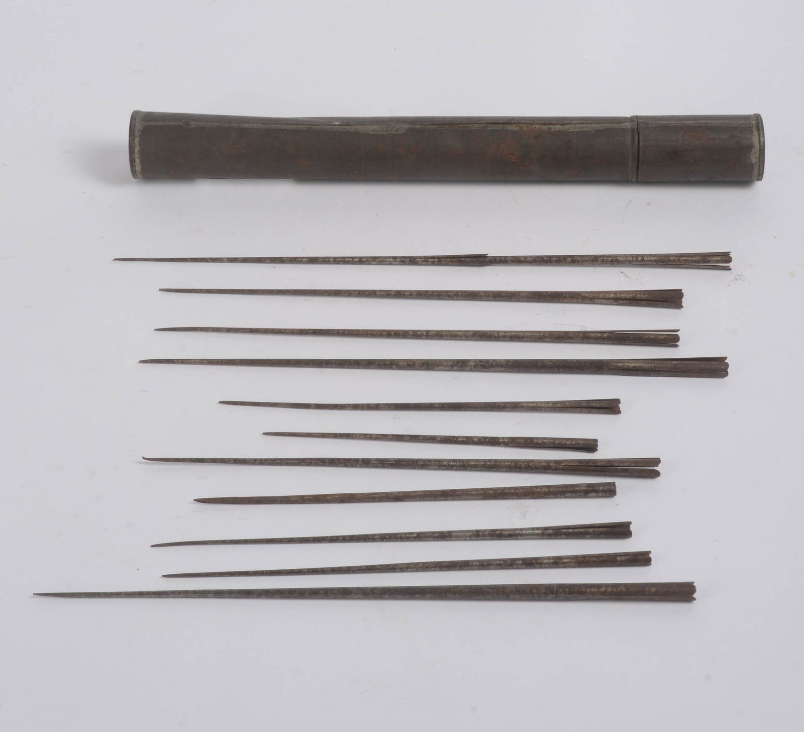 MEAT LACING TOOL.: Used to lace fat through tough cuts of meat for a more tender meal, tin, in a case, 18th or 19th century. Length 11 inches.