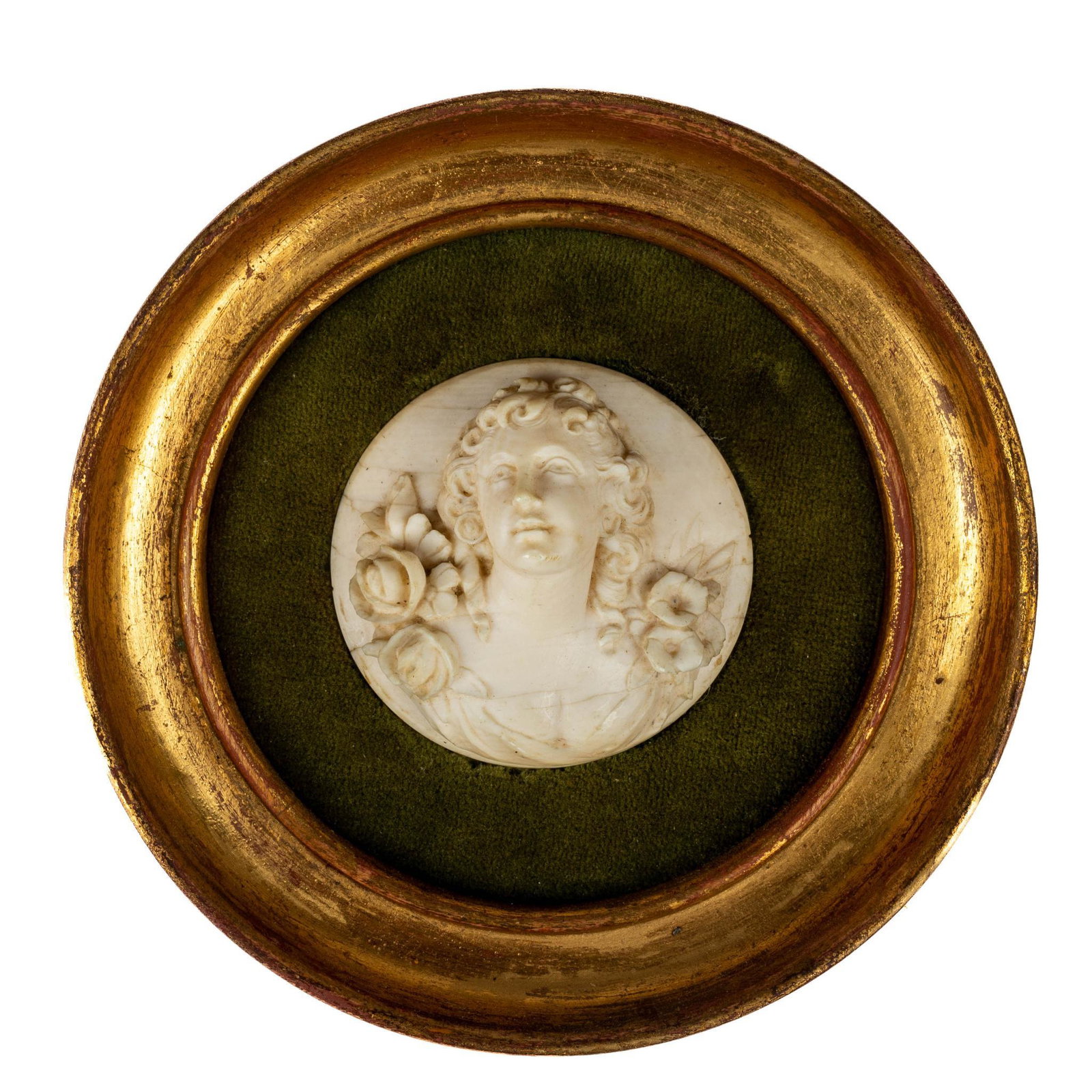 MINIATURE BUST CARVING OF WOMAN AND FLOWERS: Approx. 2 inches on 5 inches gilded frame.