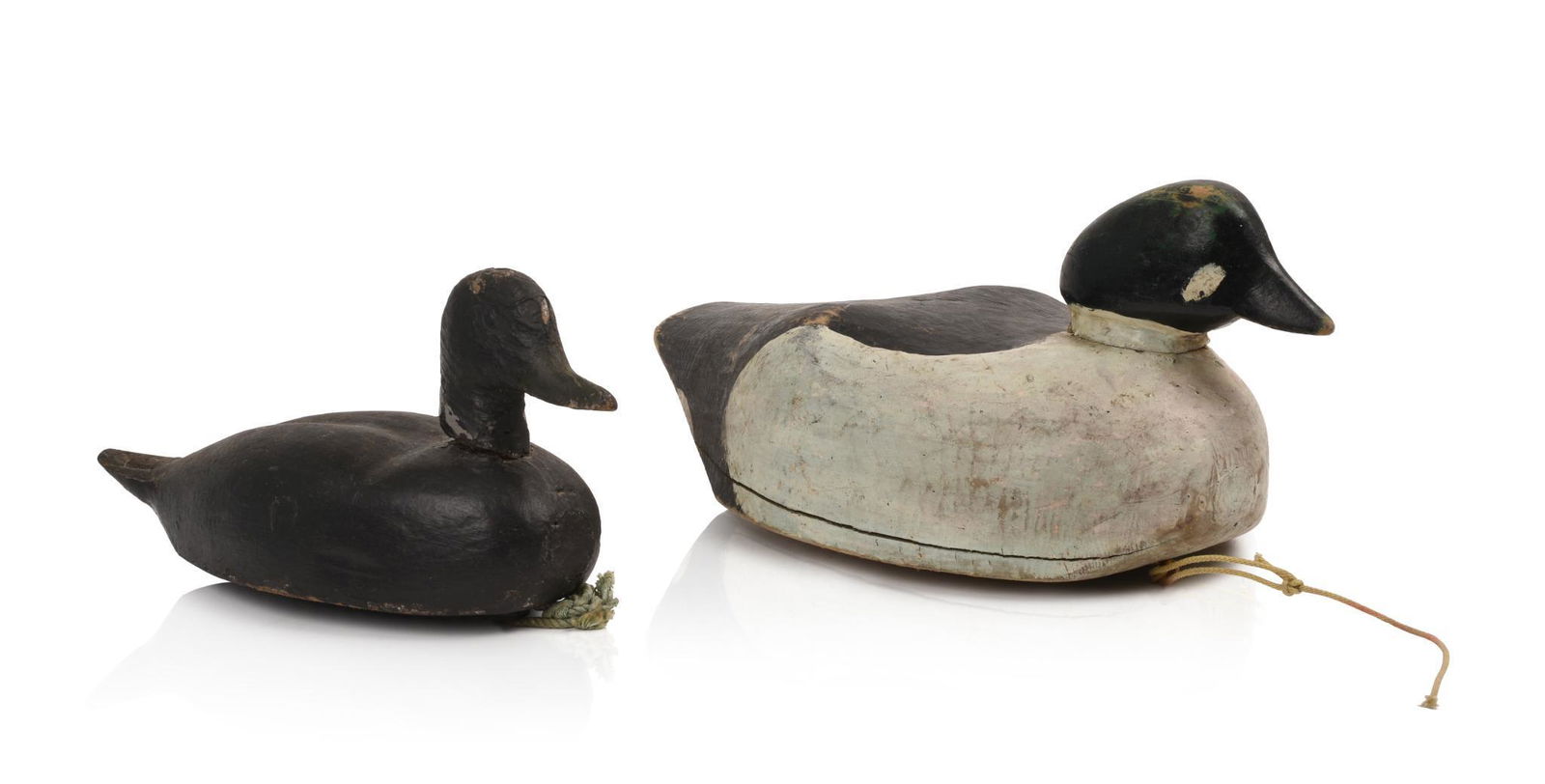 Two Painted Wooden Decoys. (1 of 3)