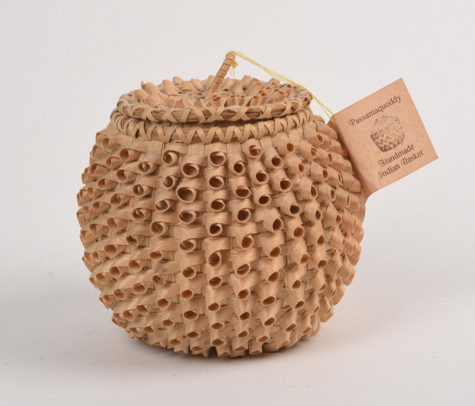 Theresa Neptune Gardner Wabanaki Woven Basket.: 2000. Passamaquoddy. Round basket with cover. Height 6.5 inches.