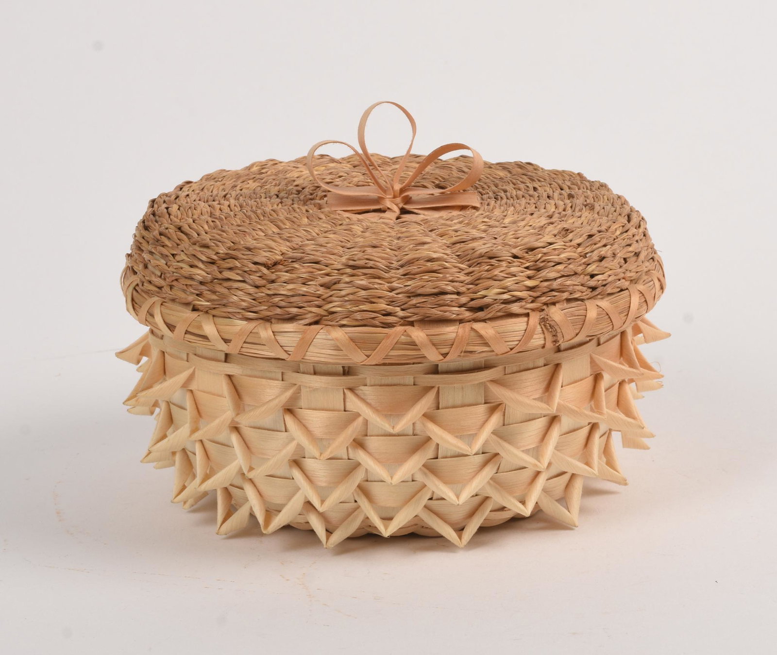 Barbara D. Francis Penobscot Woven Basket.: Round basket with cover and grass top. Diameter 5.5 inches.