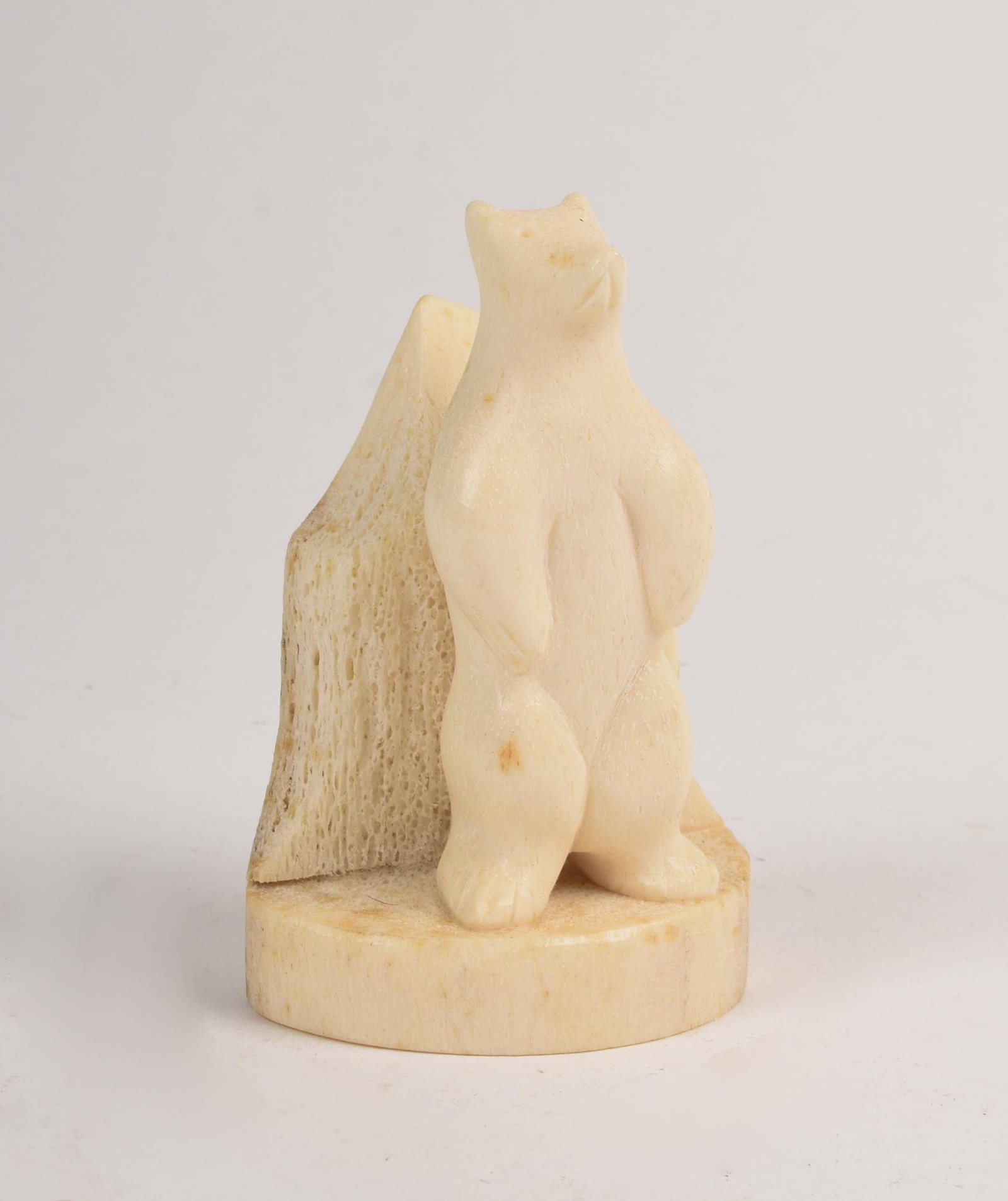 Bone Polar Bear Carving.: "E A B E" carved on back. Height 3 5/8 inches.