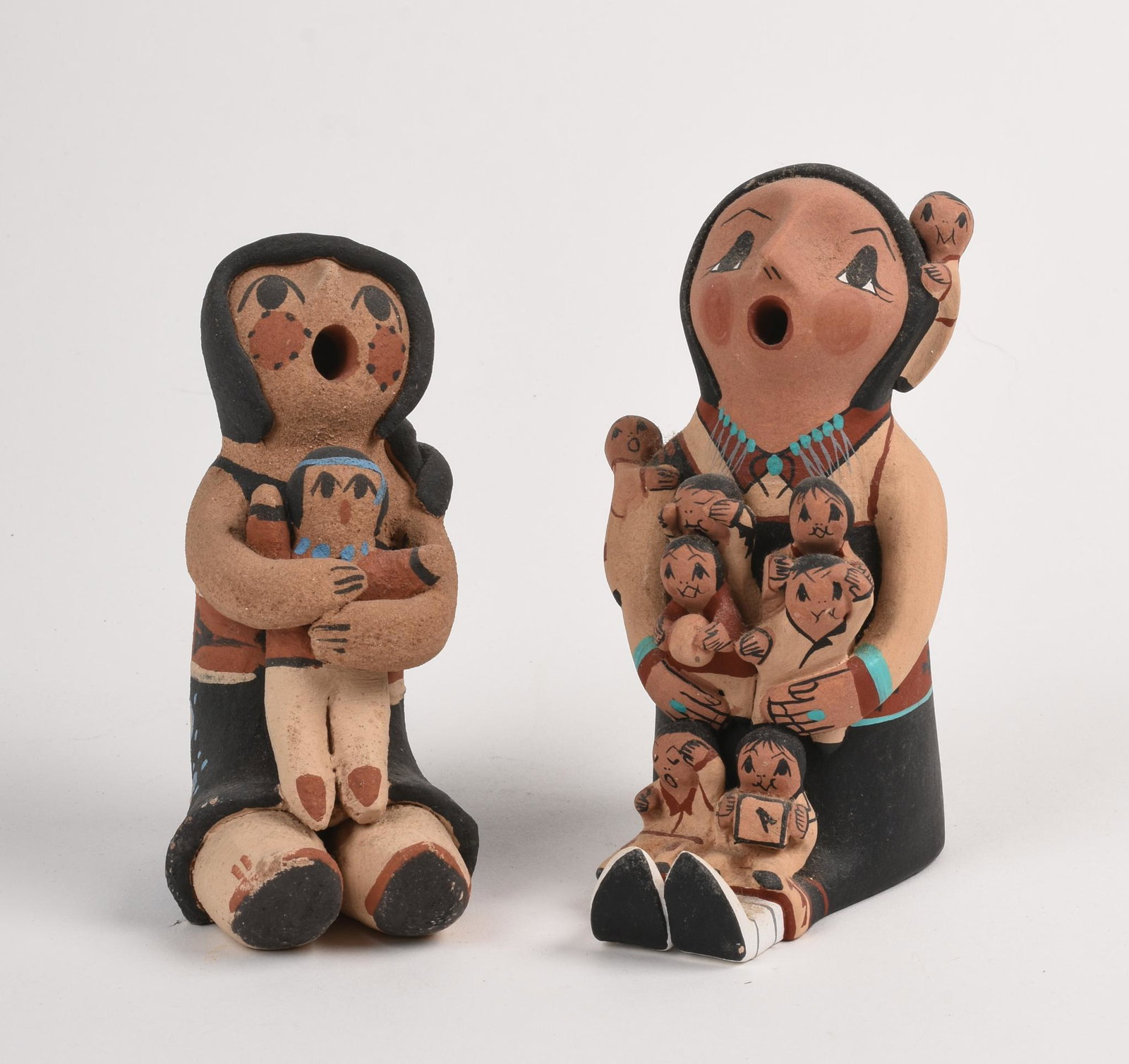 Two D. Lucero Jemez Figurines.: Red clay. Height